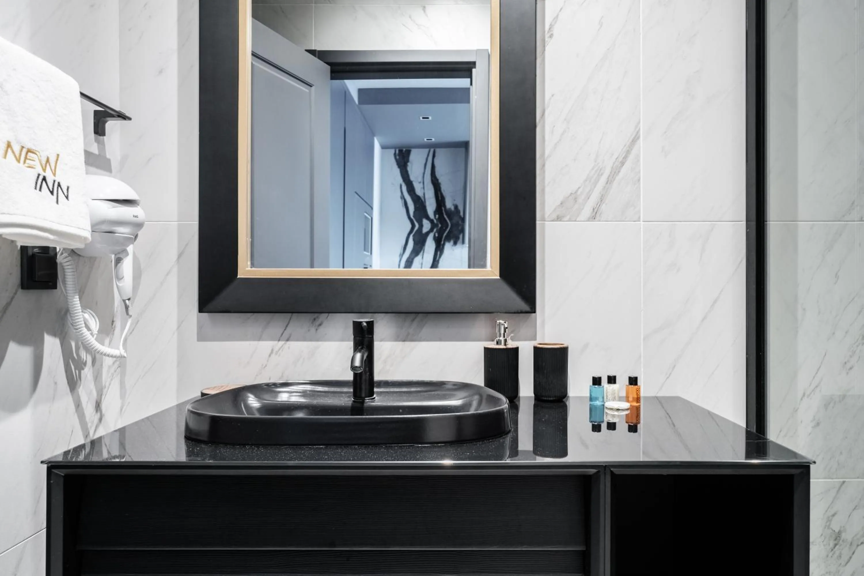 Bathroom in Benesta Residence by NewInn