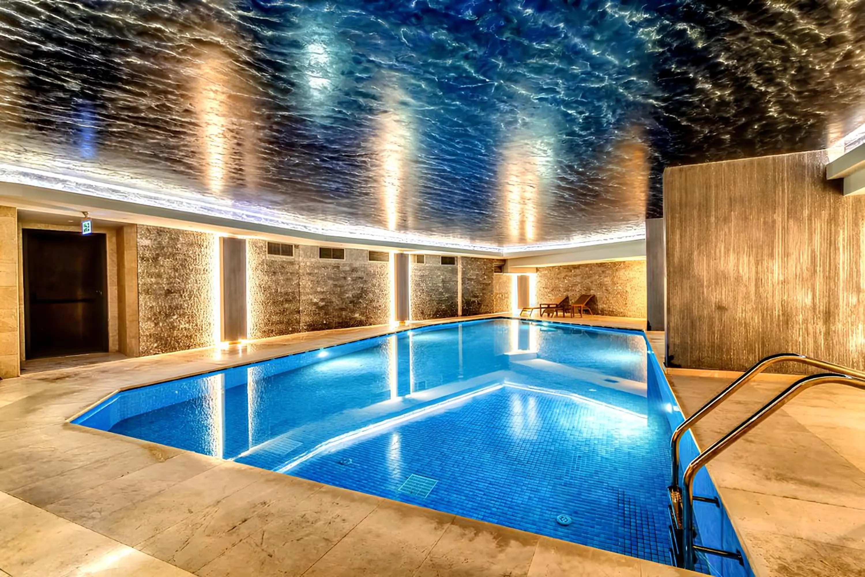 Swimming pool in Benesta Residence by NewInn