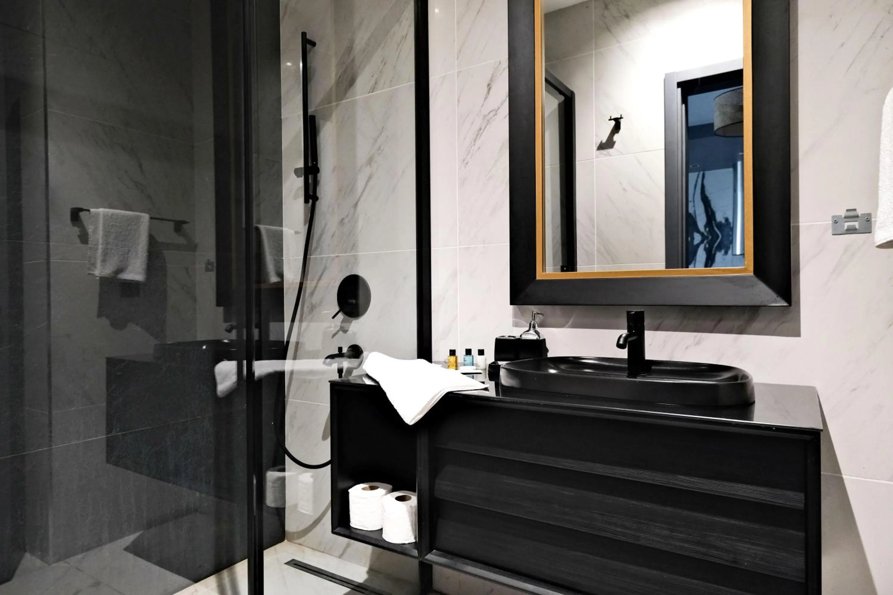 Bathroom in Benesta Residence by NewInn