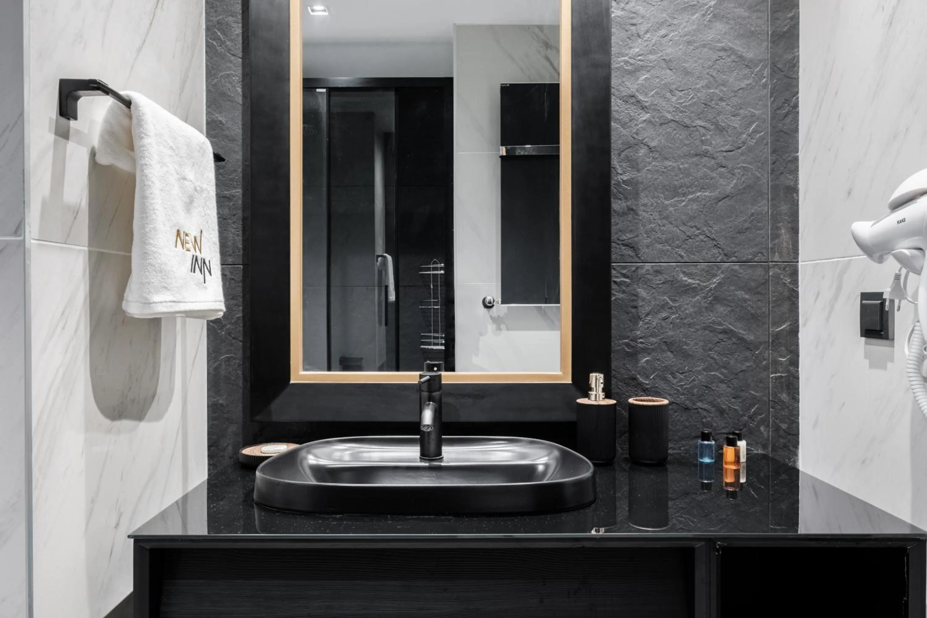 Bathroom in Benesta Residence by NewInn