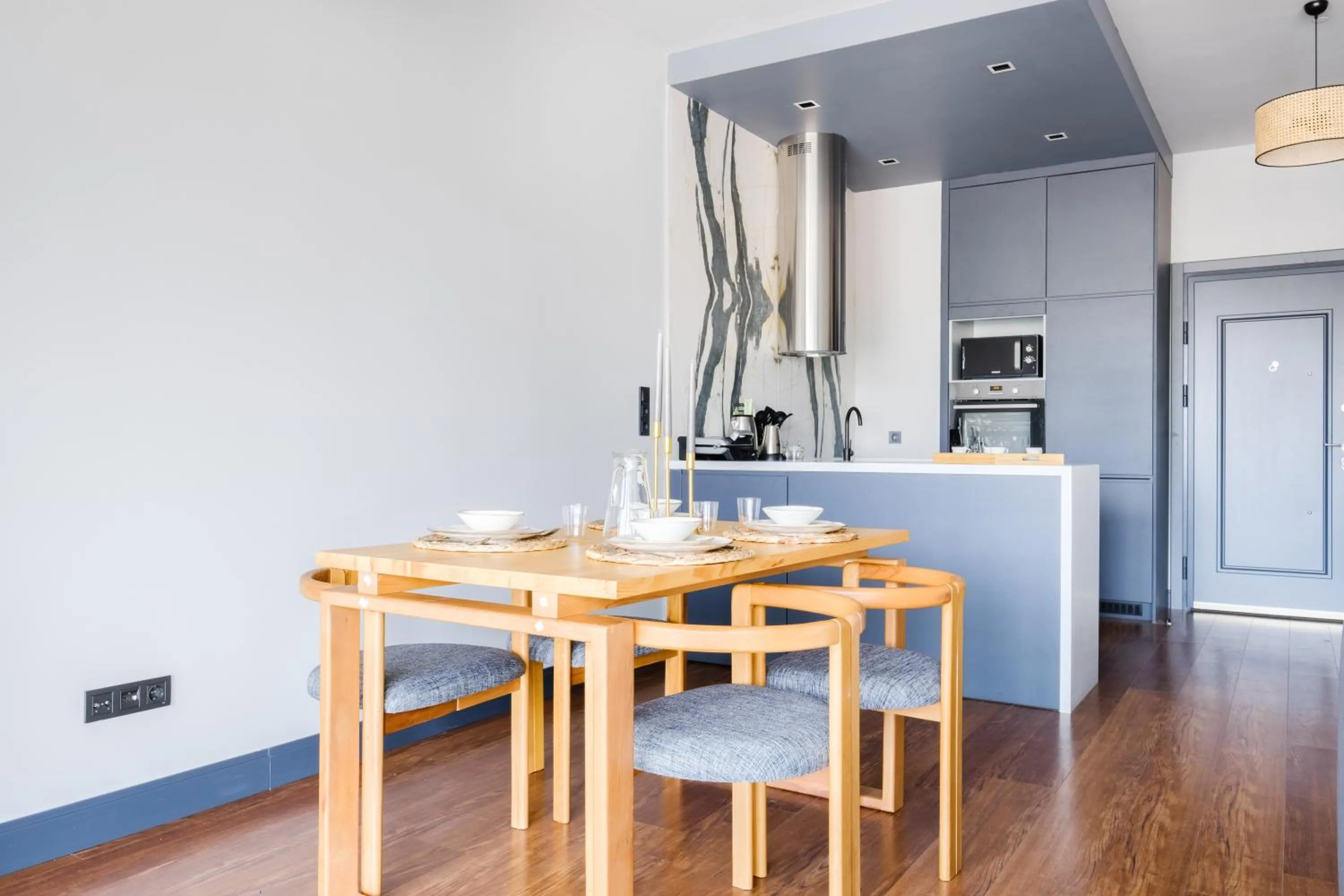 Dining area in Benesta Residence by NewInn
