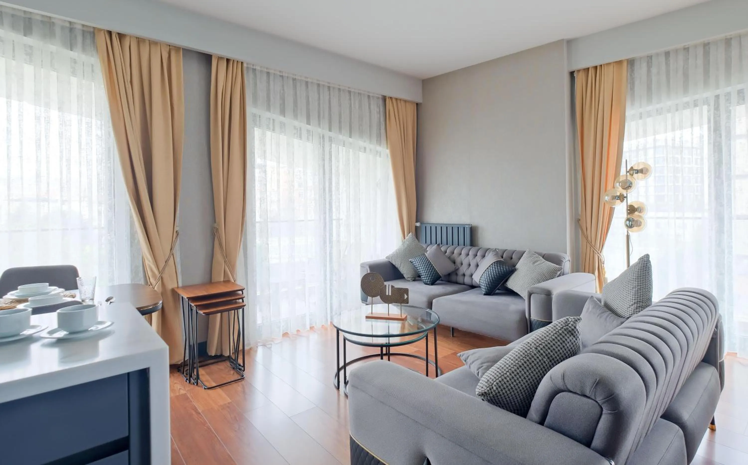 Living room in Benesta Residence by NewInn