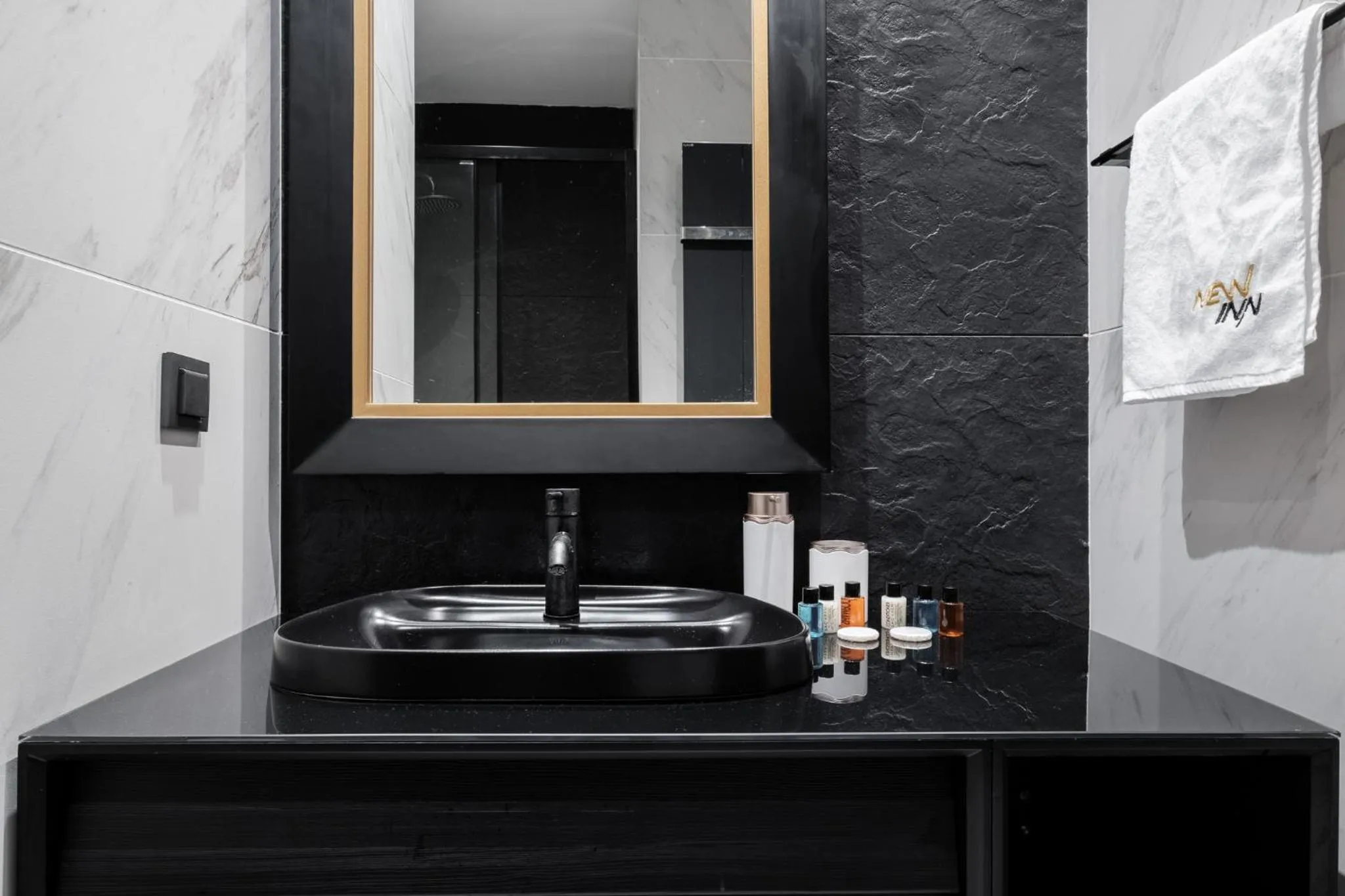 Bathroom in Benesta Residence by NewInn