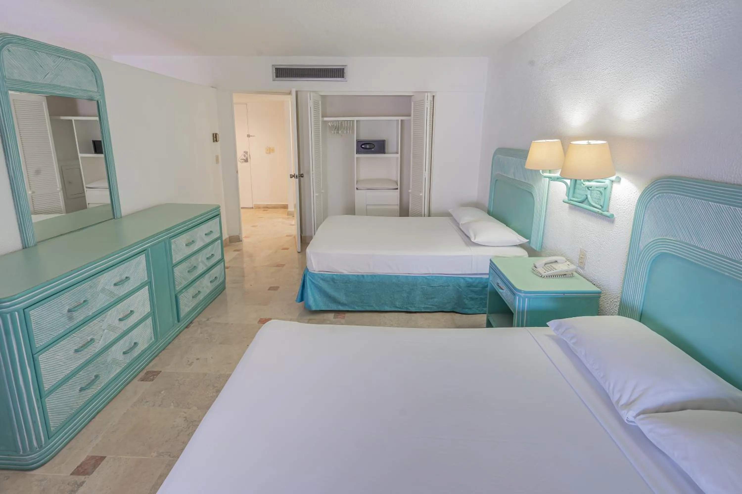 Bed in Playa Suites Acapulco