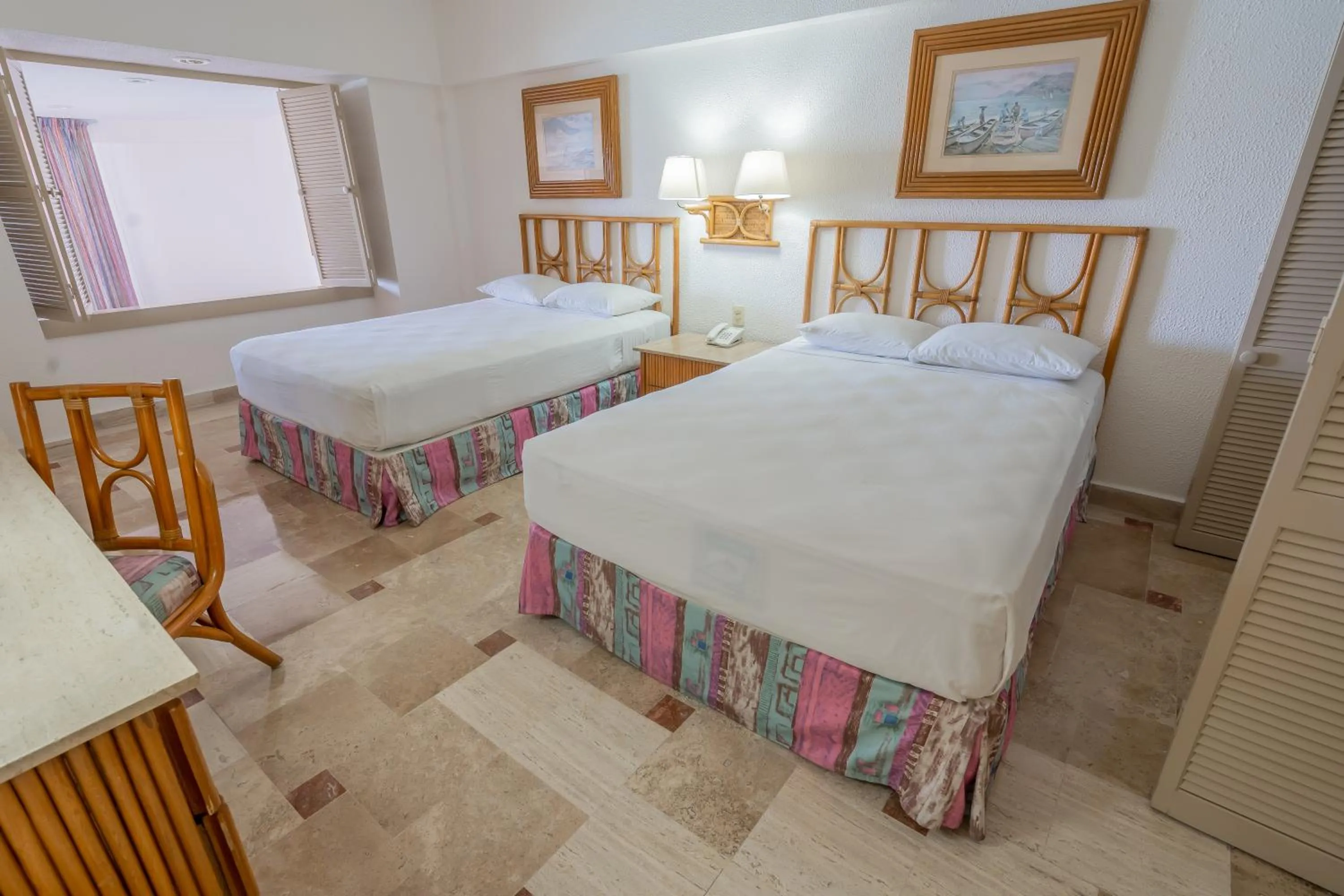 Bed in Playa Suites Acapulco