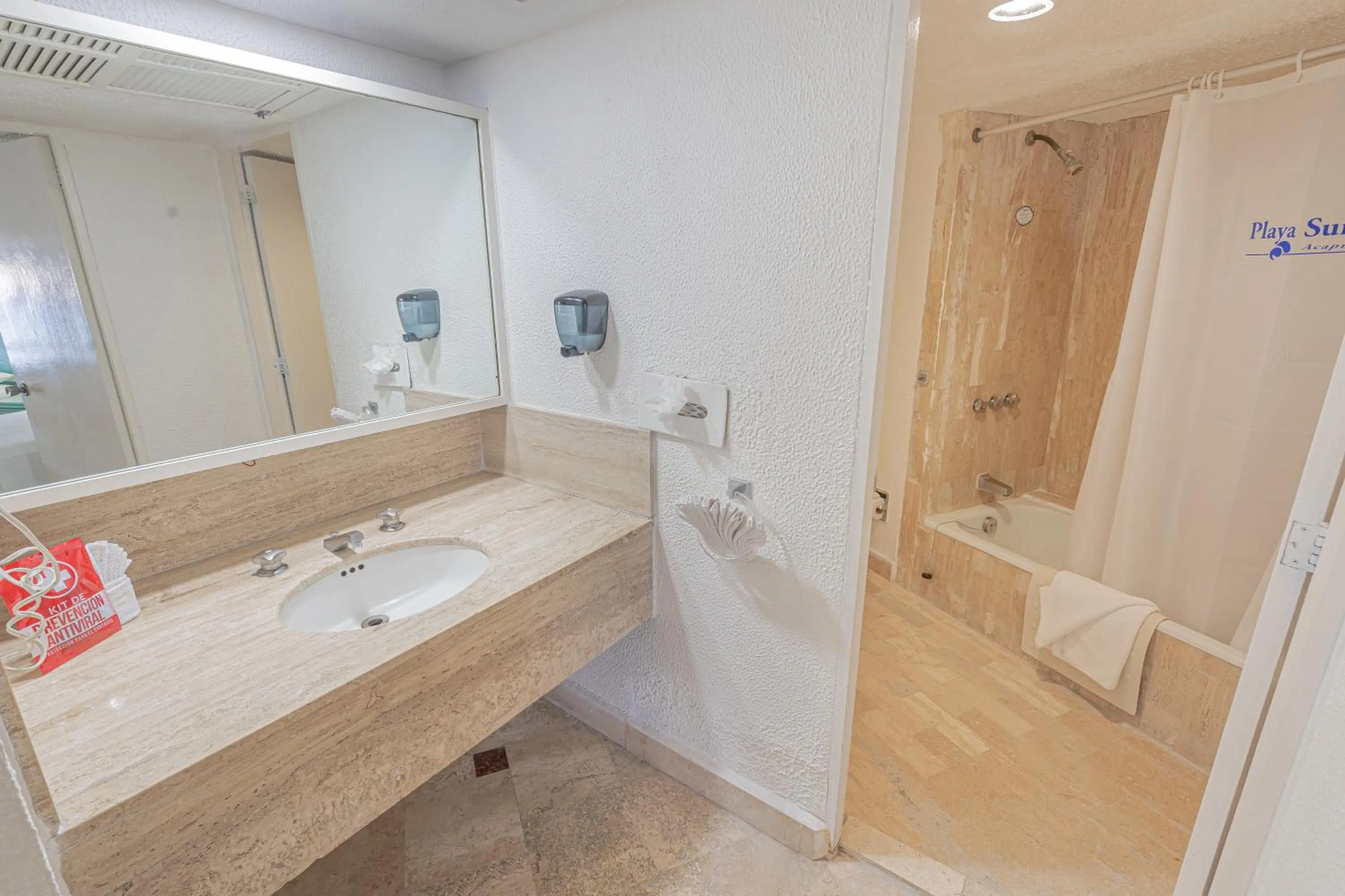 Toilet in Playa Suites Acapulco