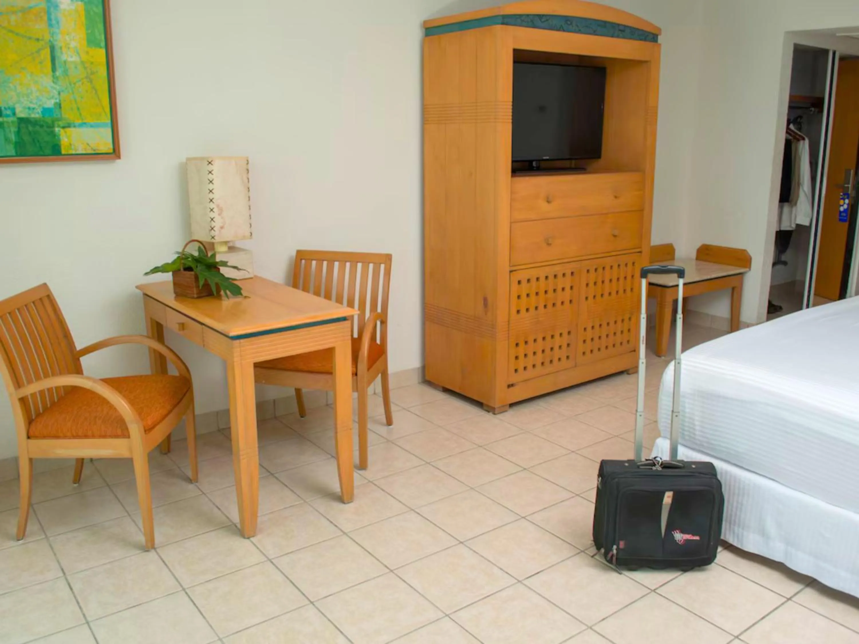 Bed in Hotel Casa Mexicana Cozumel