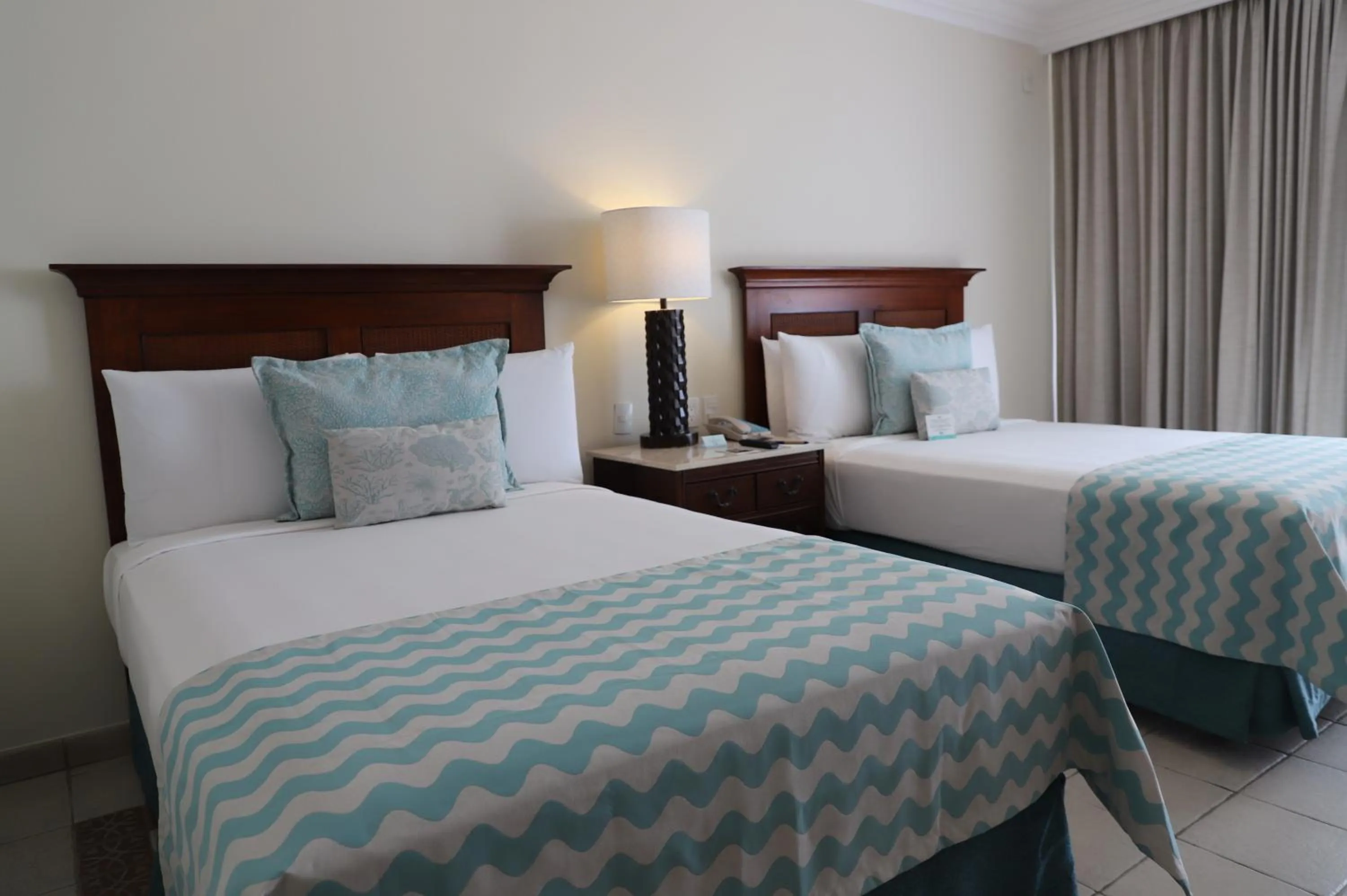 Bed in Pierre Mundo Imperial Riviera Diamante Acapulco