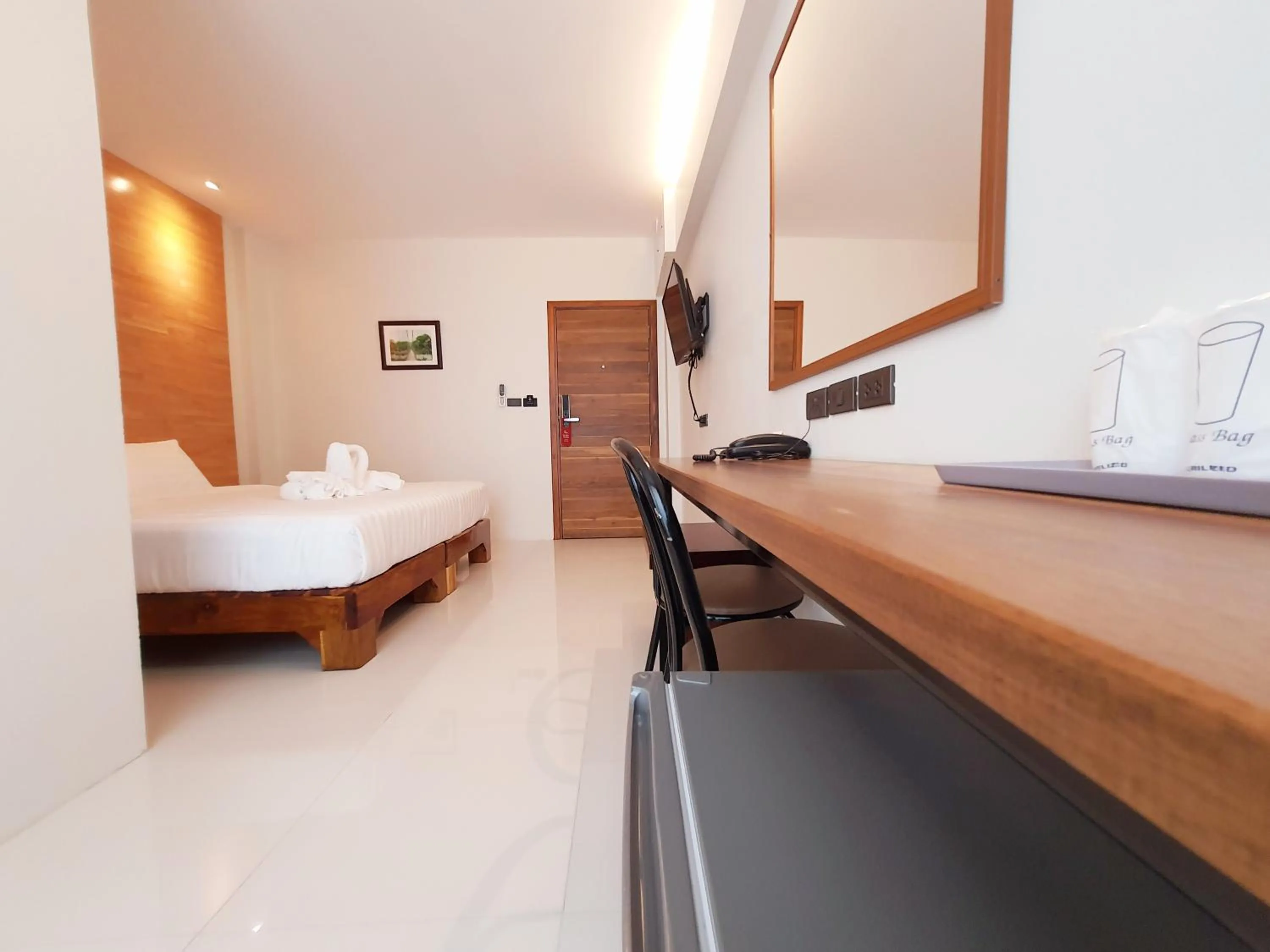 Photo of the whole room, Bed in SUhotel Suratthani