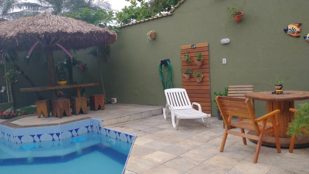 Swimming pool in POUSADA CASA DIAMANTe