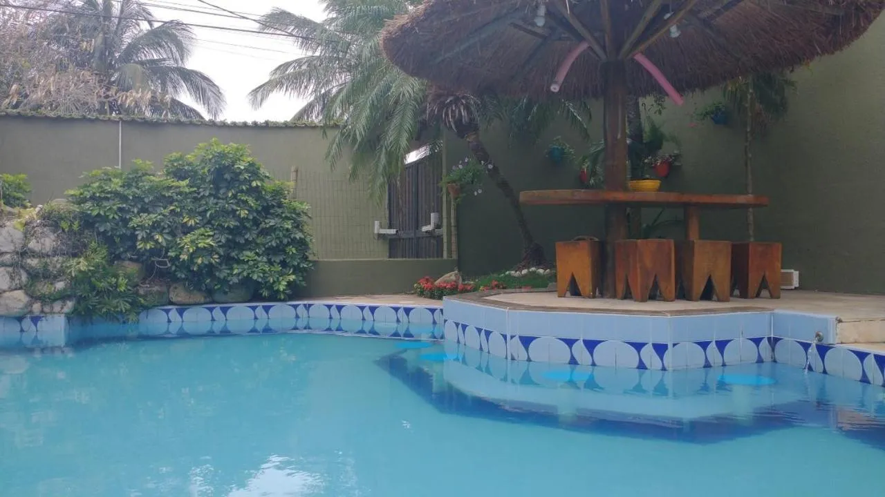 Swimming pool in POUSADA CASA DIAMANTe