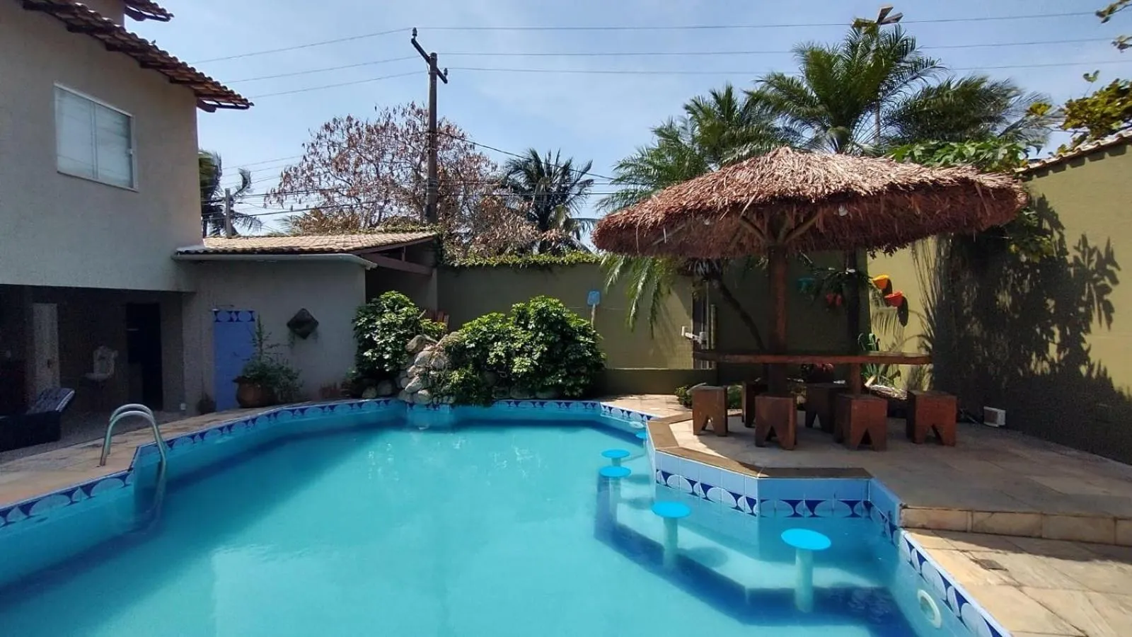 Swimming pool in POUSADA CASA DIAMANTe