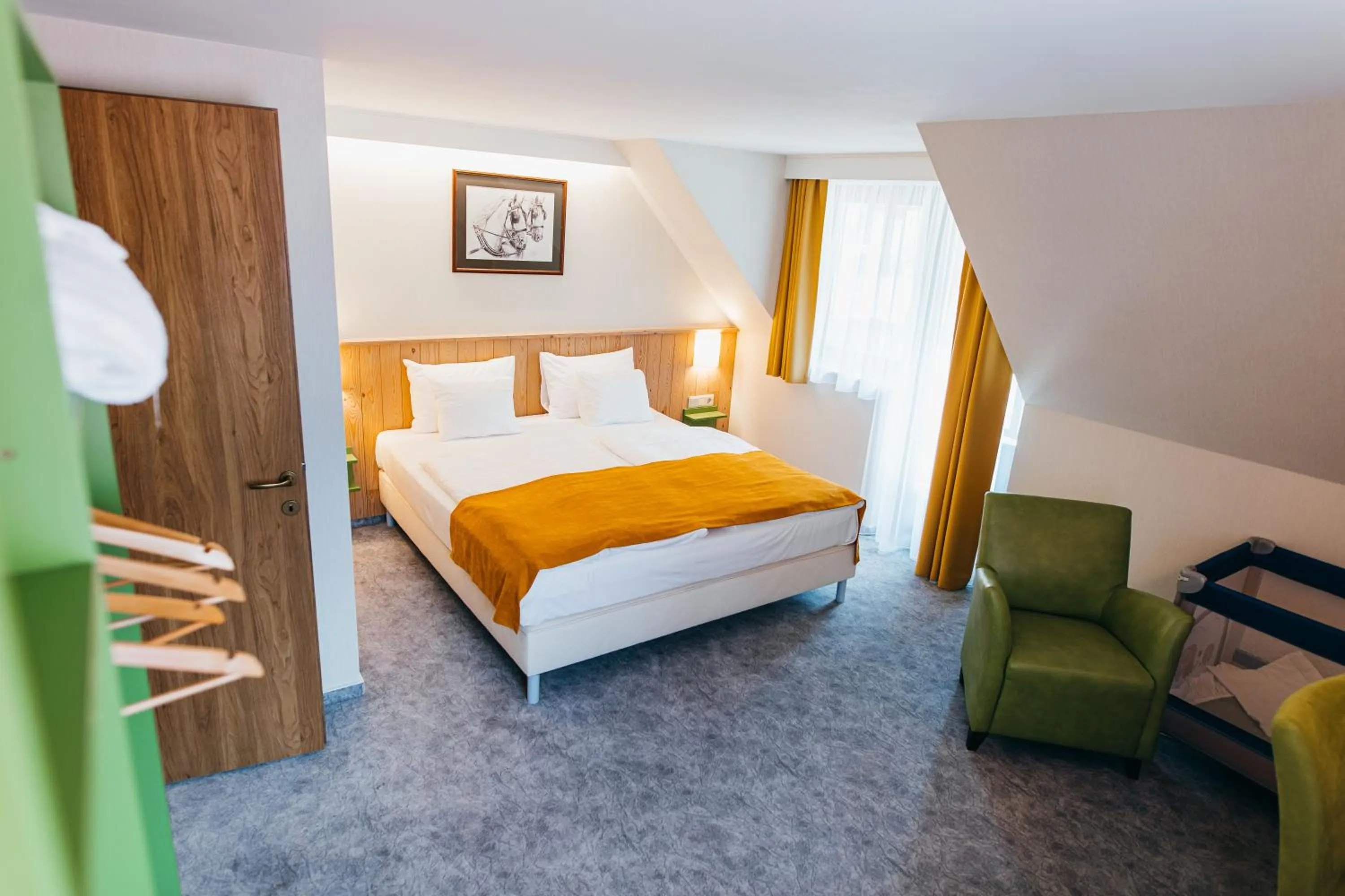 Seating area, Bed in Lobogo Resort