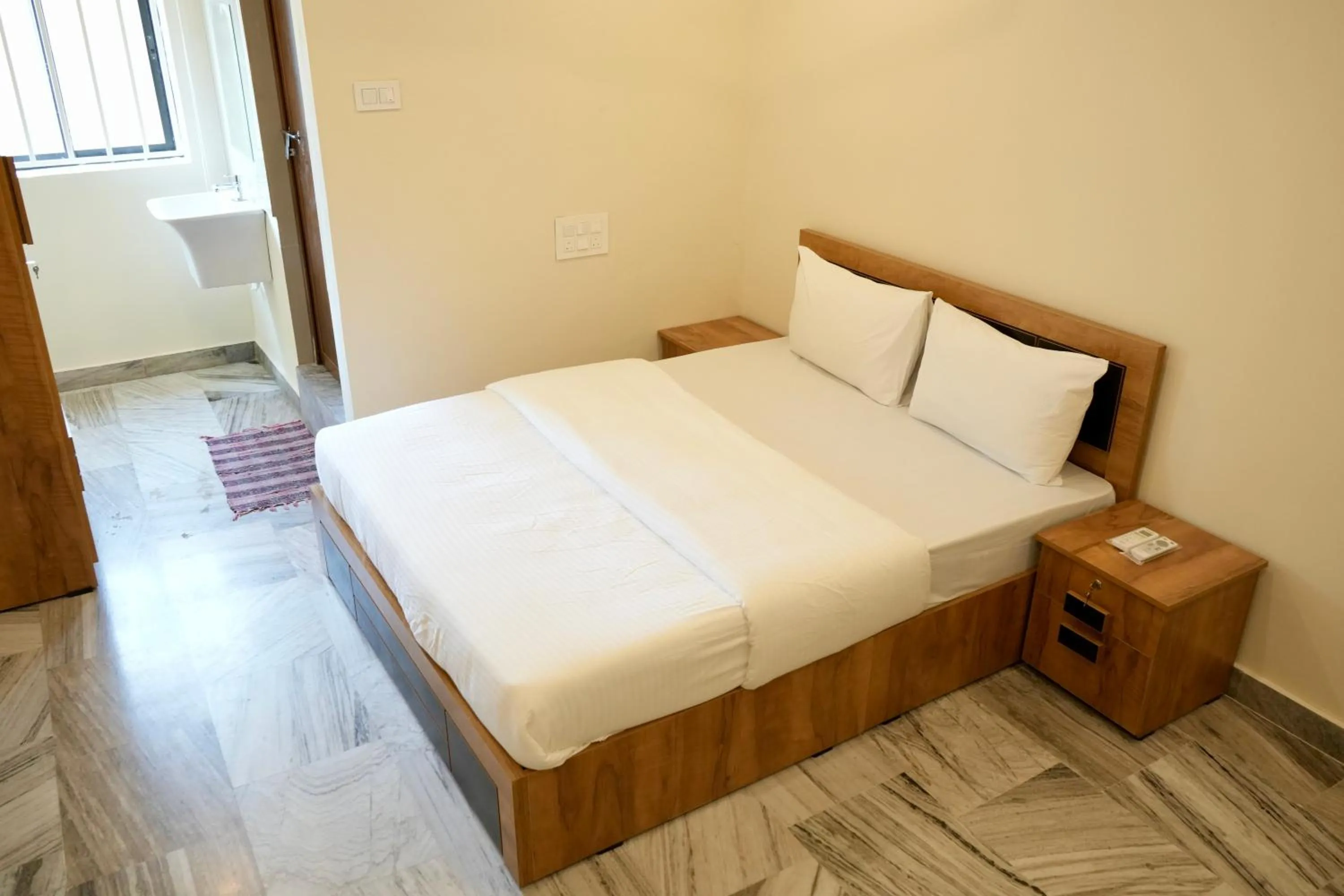 Bedroom in Kalanad Residency And Convention Centre