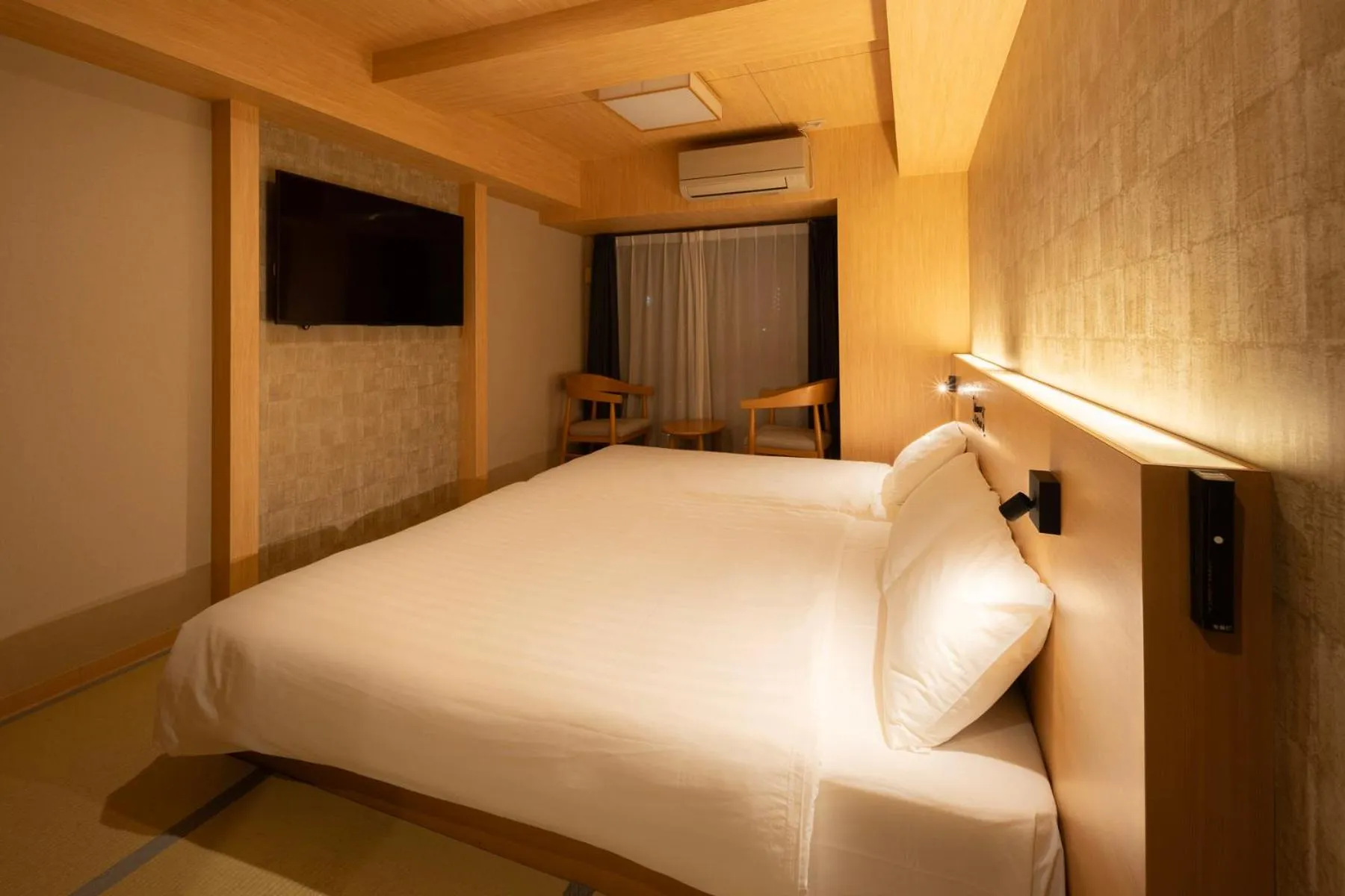 Bed in WELLSTAY Shinsekai Wakyo