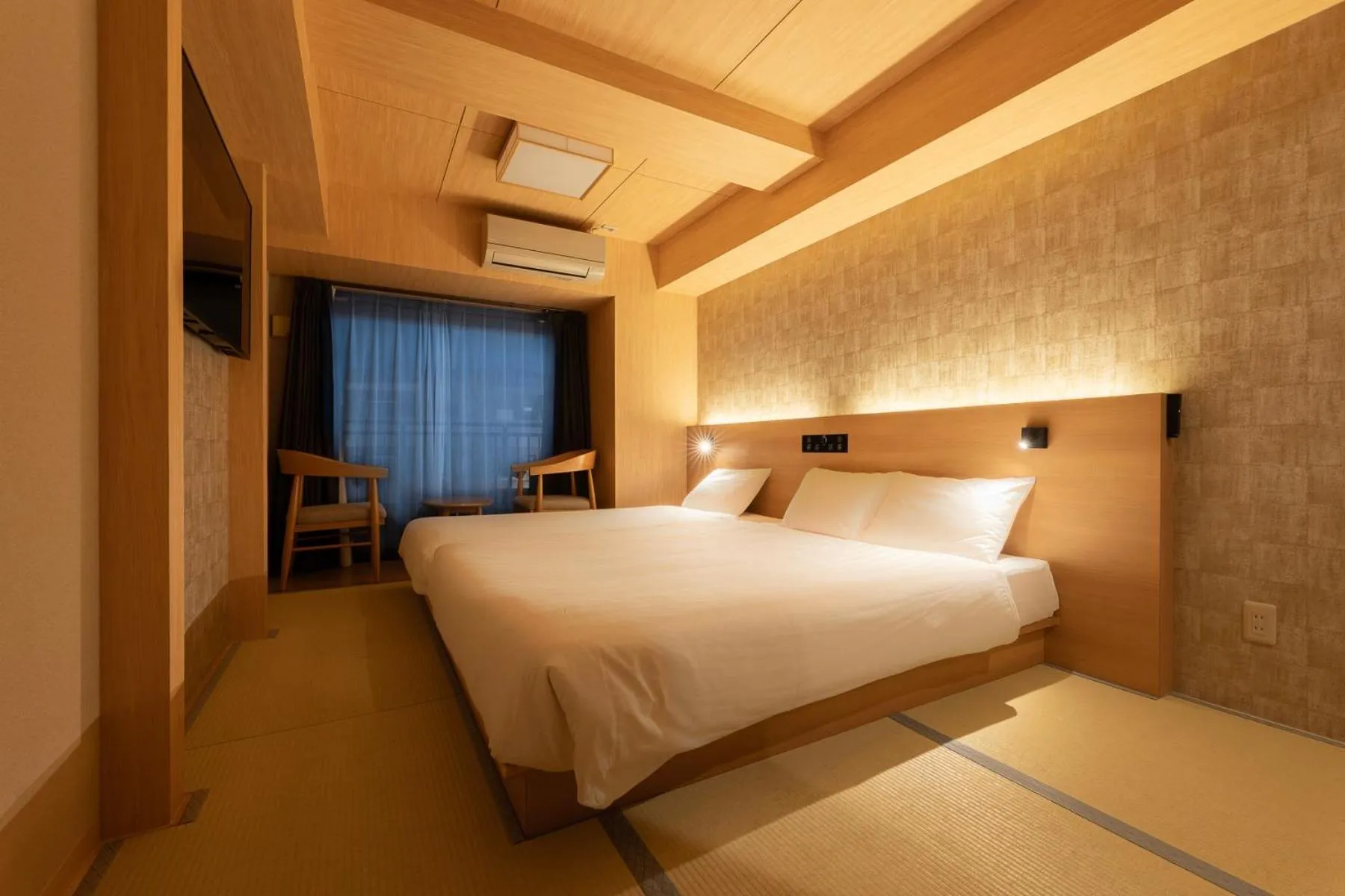 Bed in WELLSTAY Shinsekai Wakyo