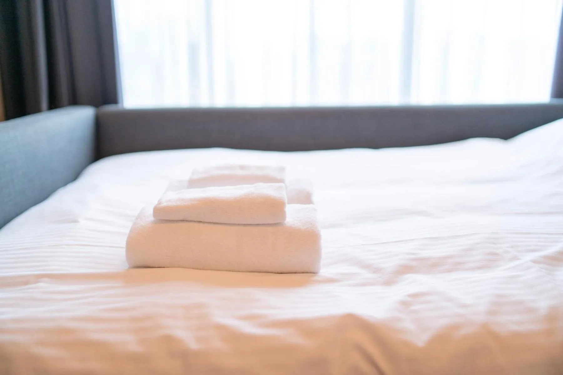 Bed in WELLSTAY Shinsekai Wakyo