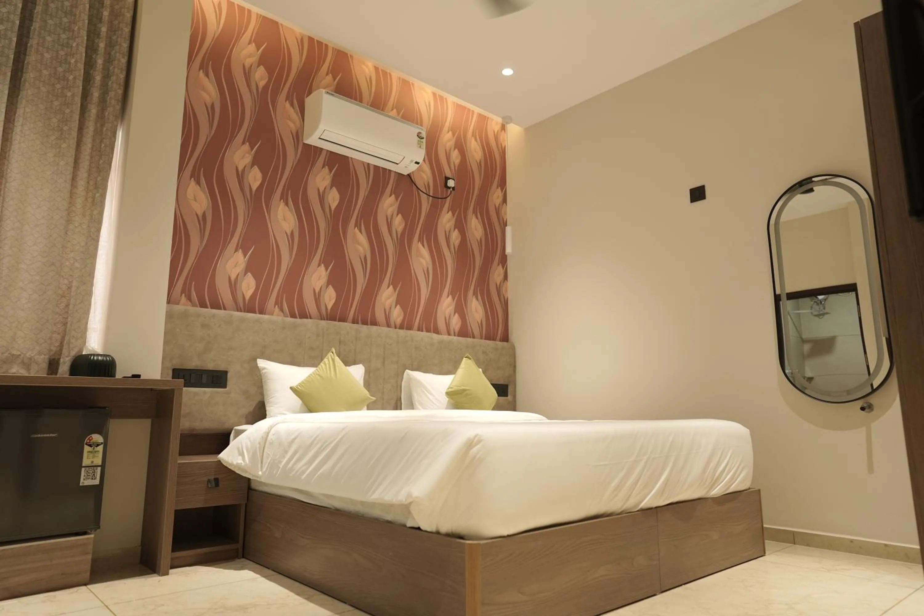 Bed in Muziris Manor Residency