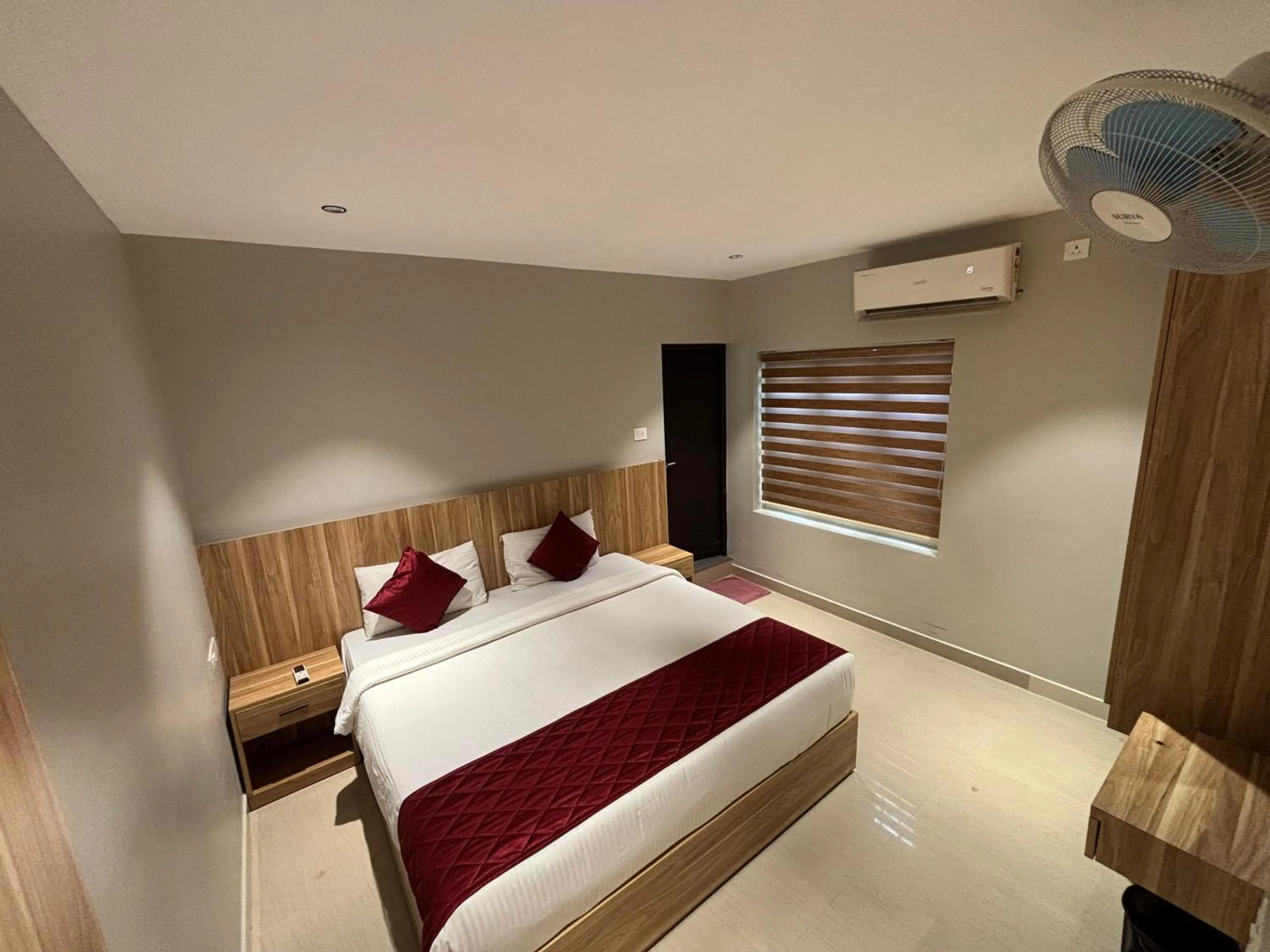 Bed in Muziris Manor Residency