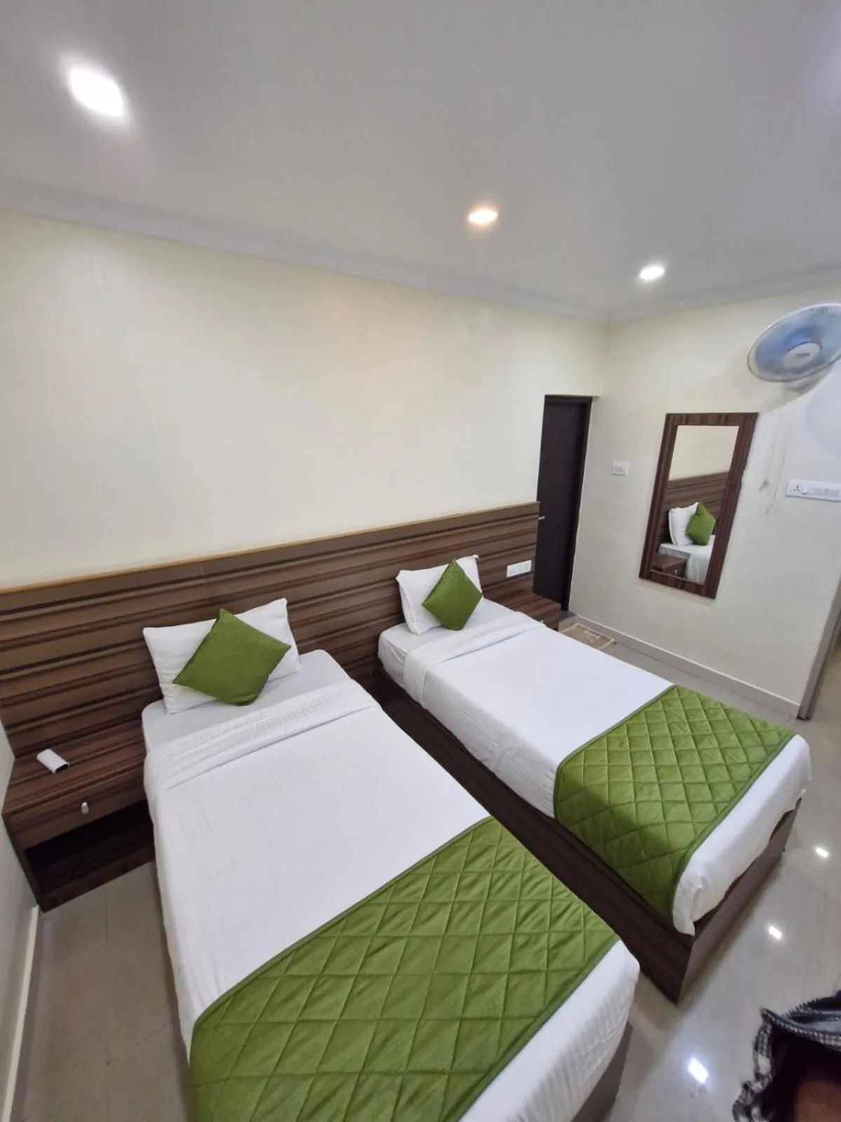 Bed in Muziris Manor Residency