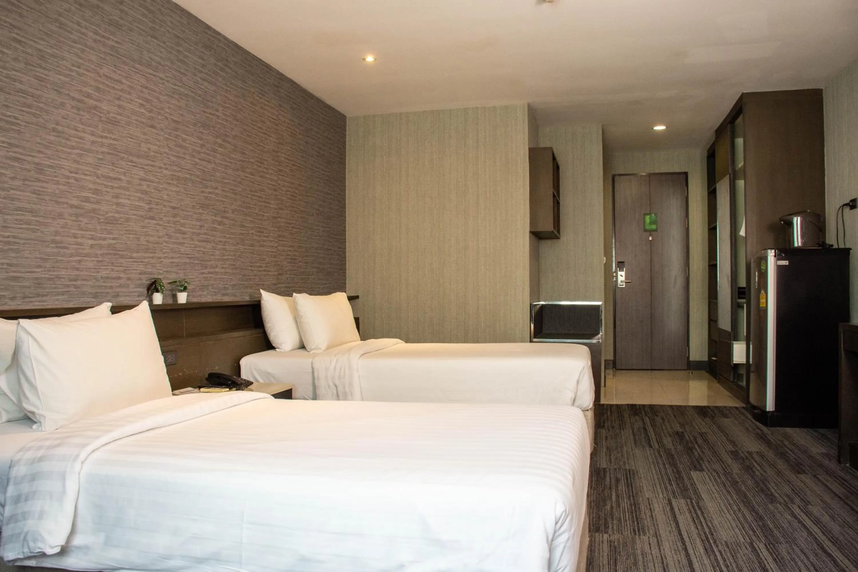 Photo of the whole room, Bed in Chor Cher The Luxury Green Hotel - SHA Extra Plus