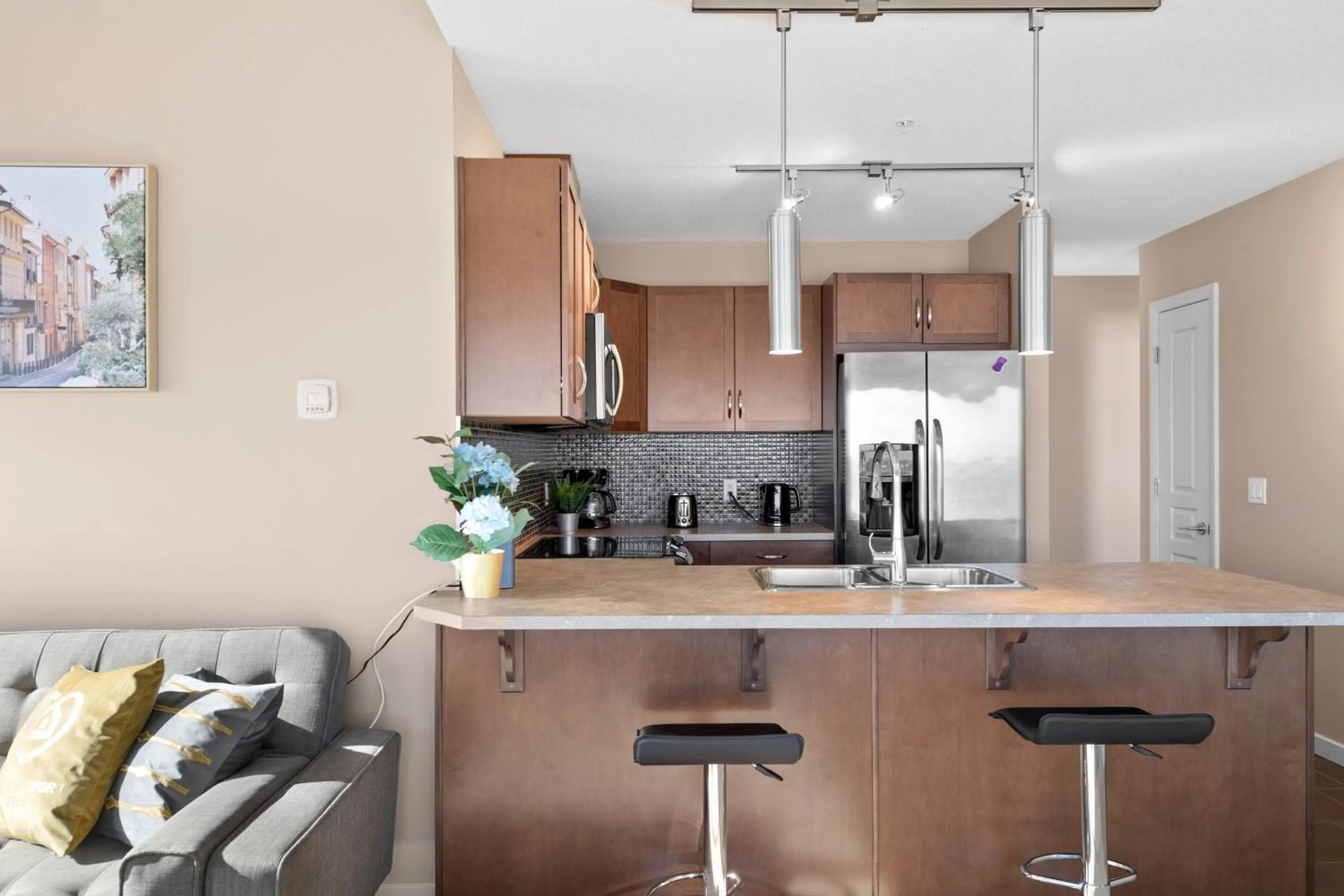 kitchen in Stylish Downtown Condos by GLOBALSTAY