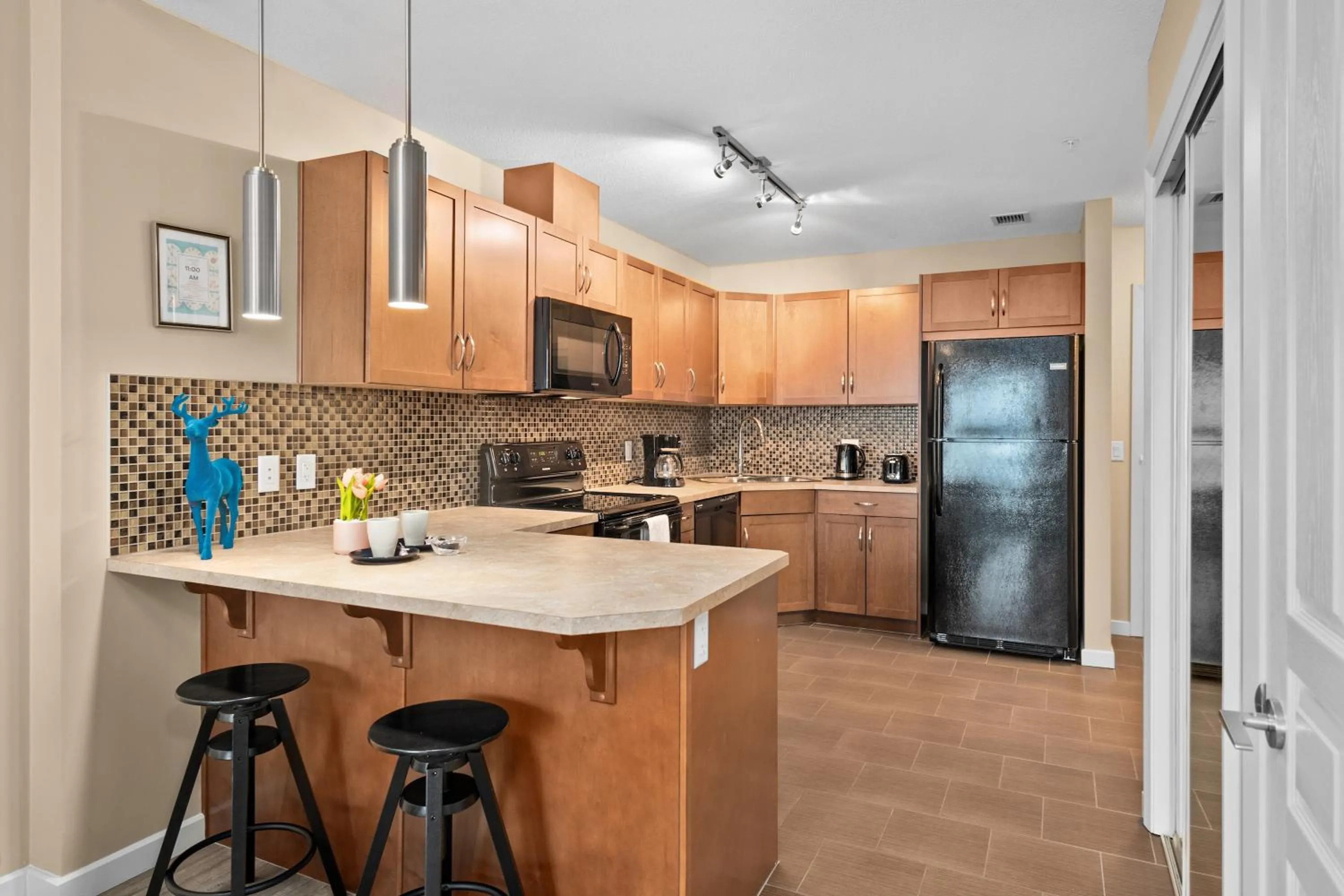 Kitchen or kitchenette in Stylish Downtown Condos by GLOBALSTAY