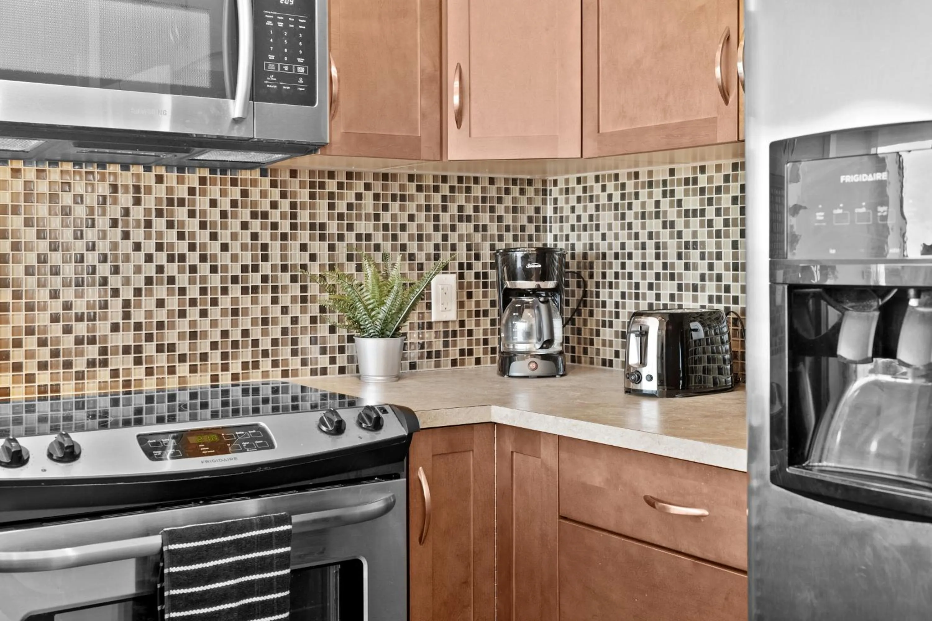 kitchen in Stylish Downtown Condos by GLOBALSTAY