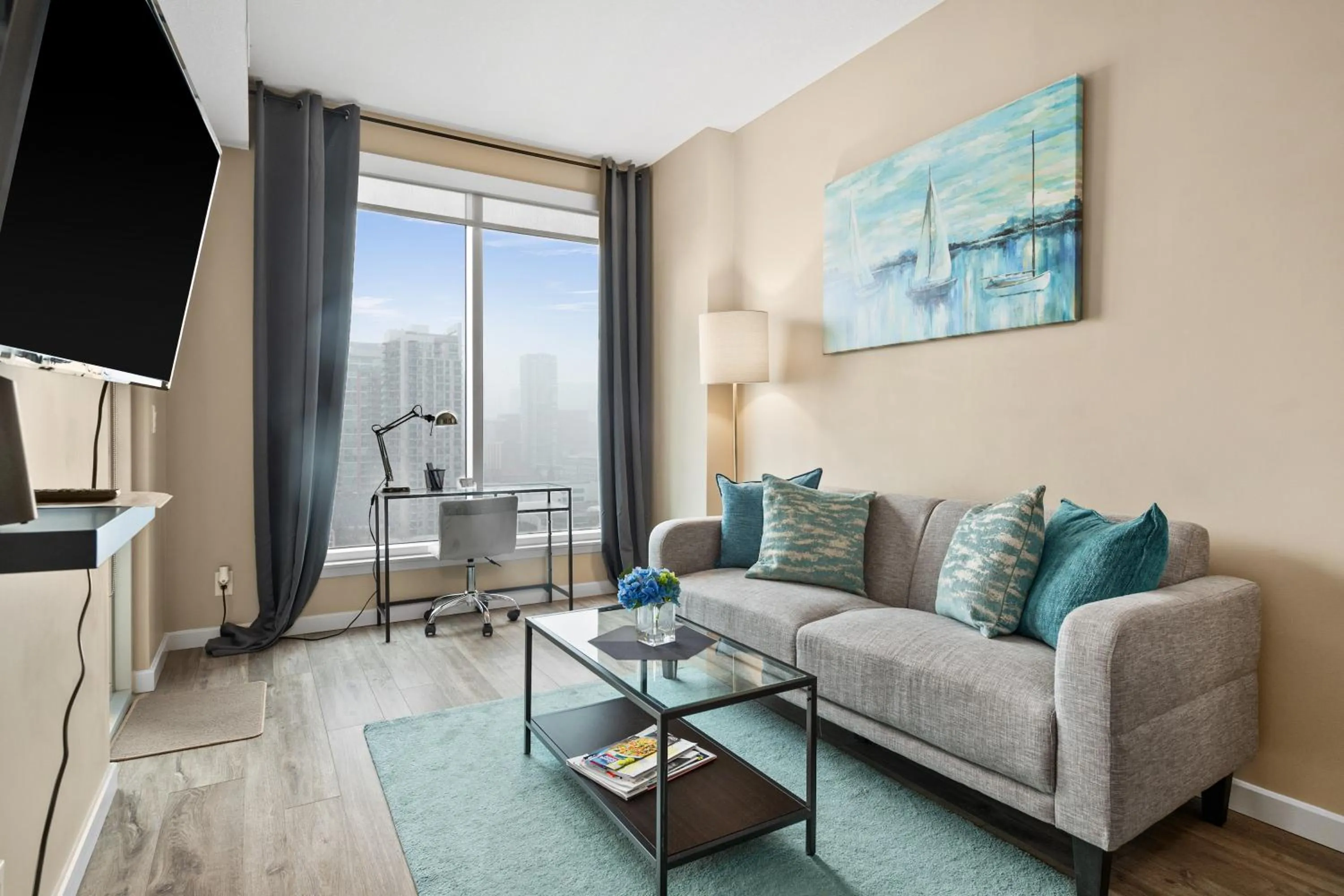 Living room in Stylish Downtown Condos by GLOBALSTAY