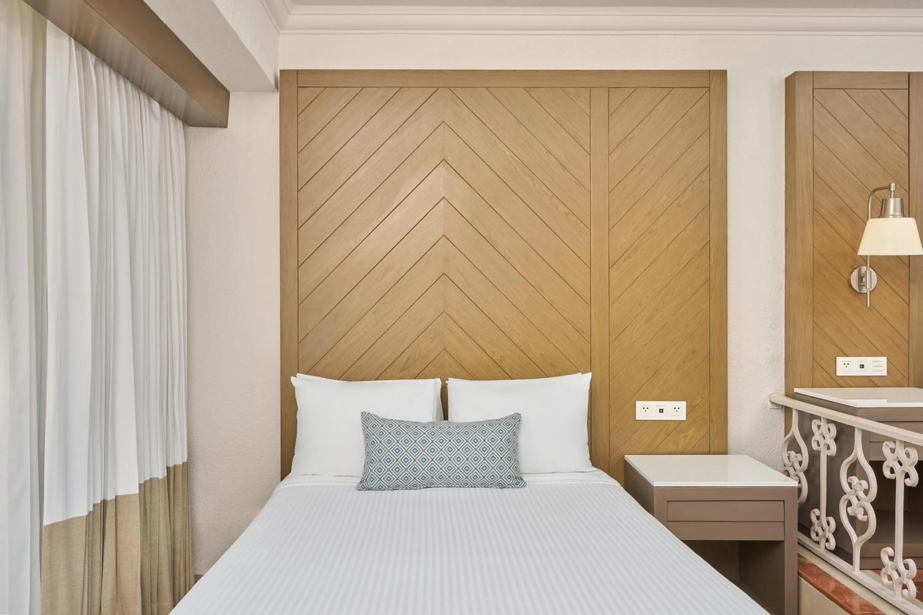 Bed in Sunscape Cancun All-Inclusive Resort & Spa by Hyatt