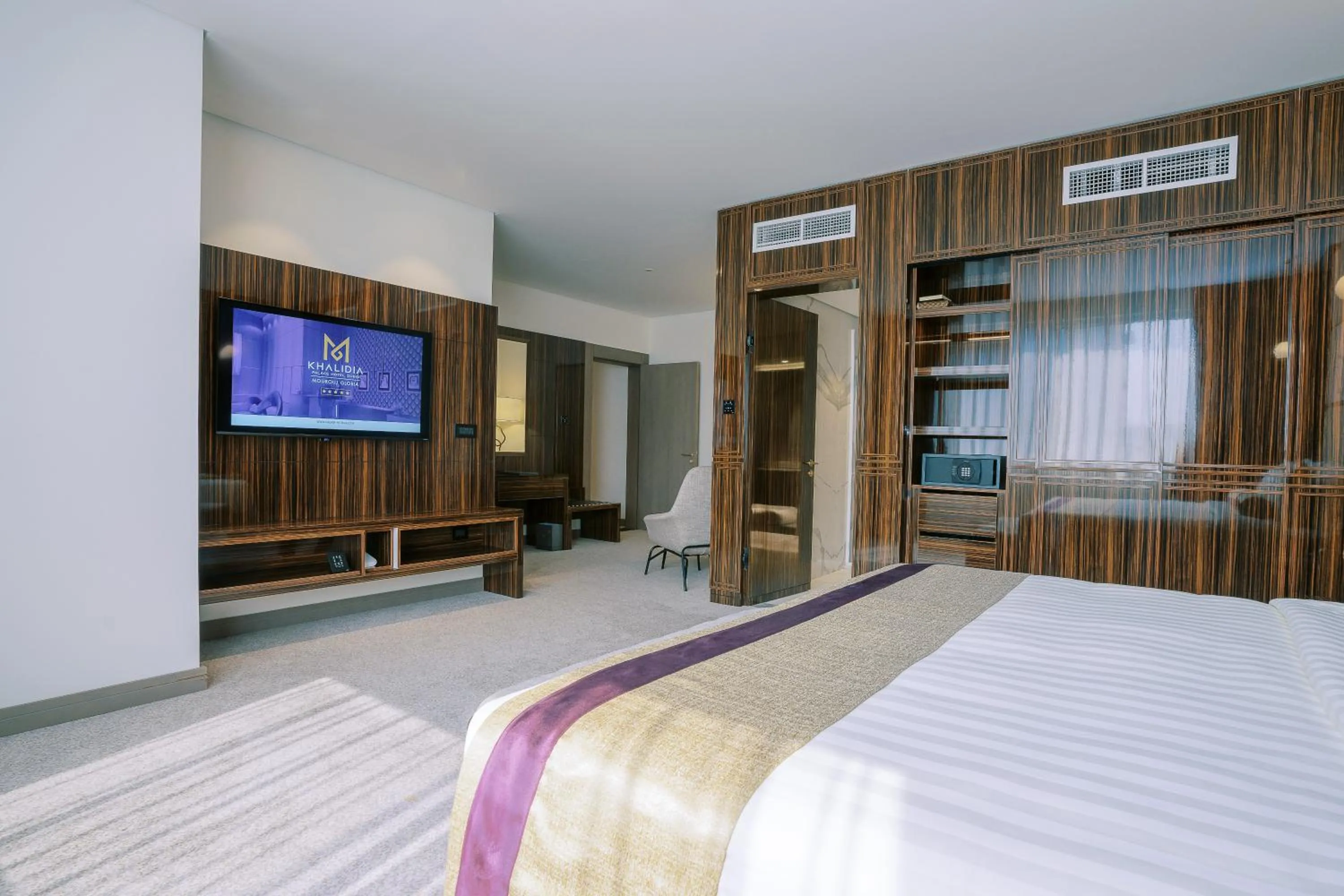 Bed in Khalidia Palace Hotel Dubai by Mourouj Gloria