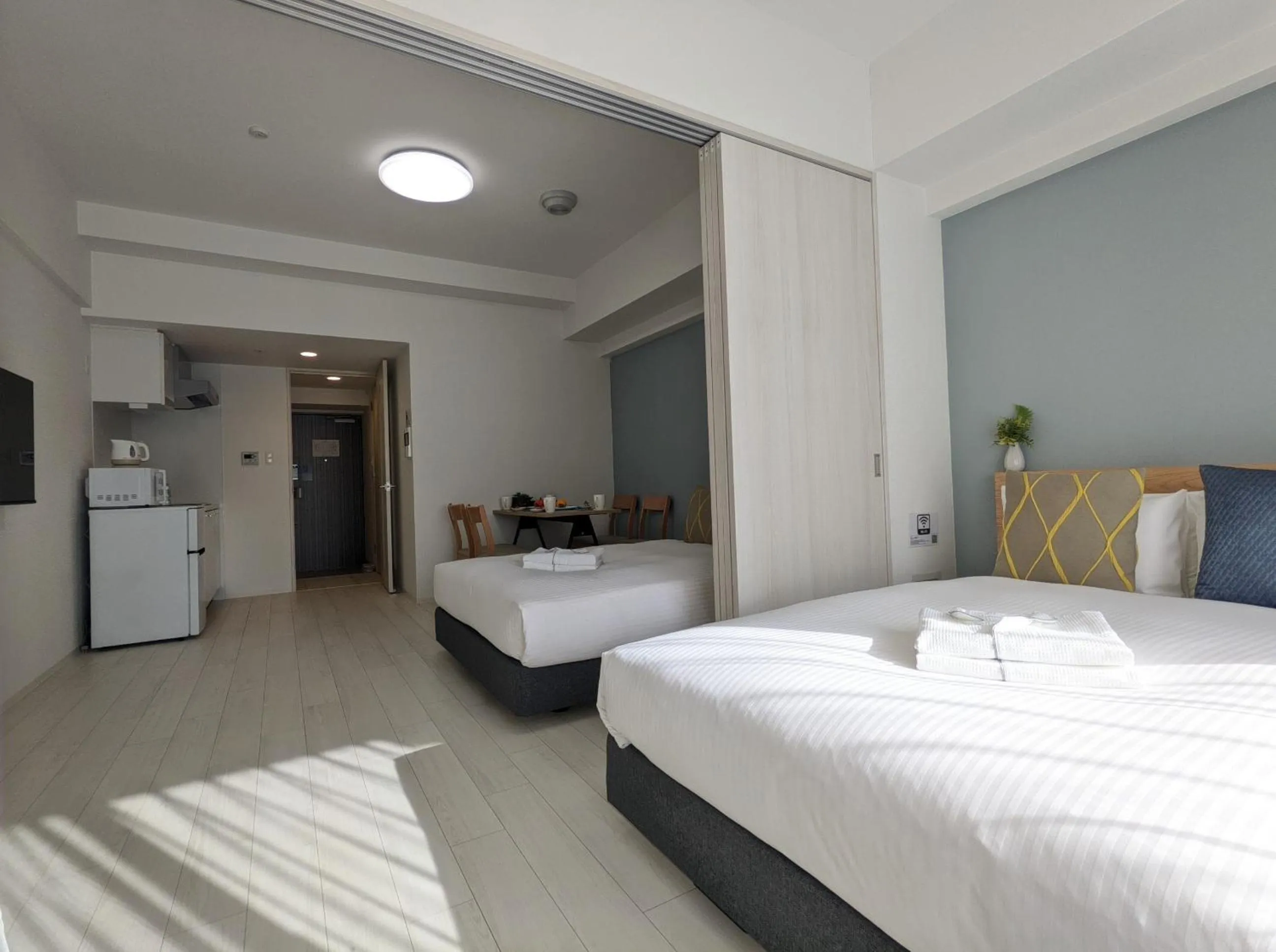 Bed in ESLEAD HOTEL Namba Daikokucho