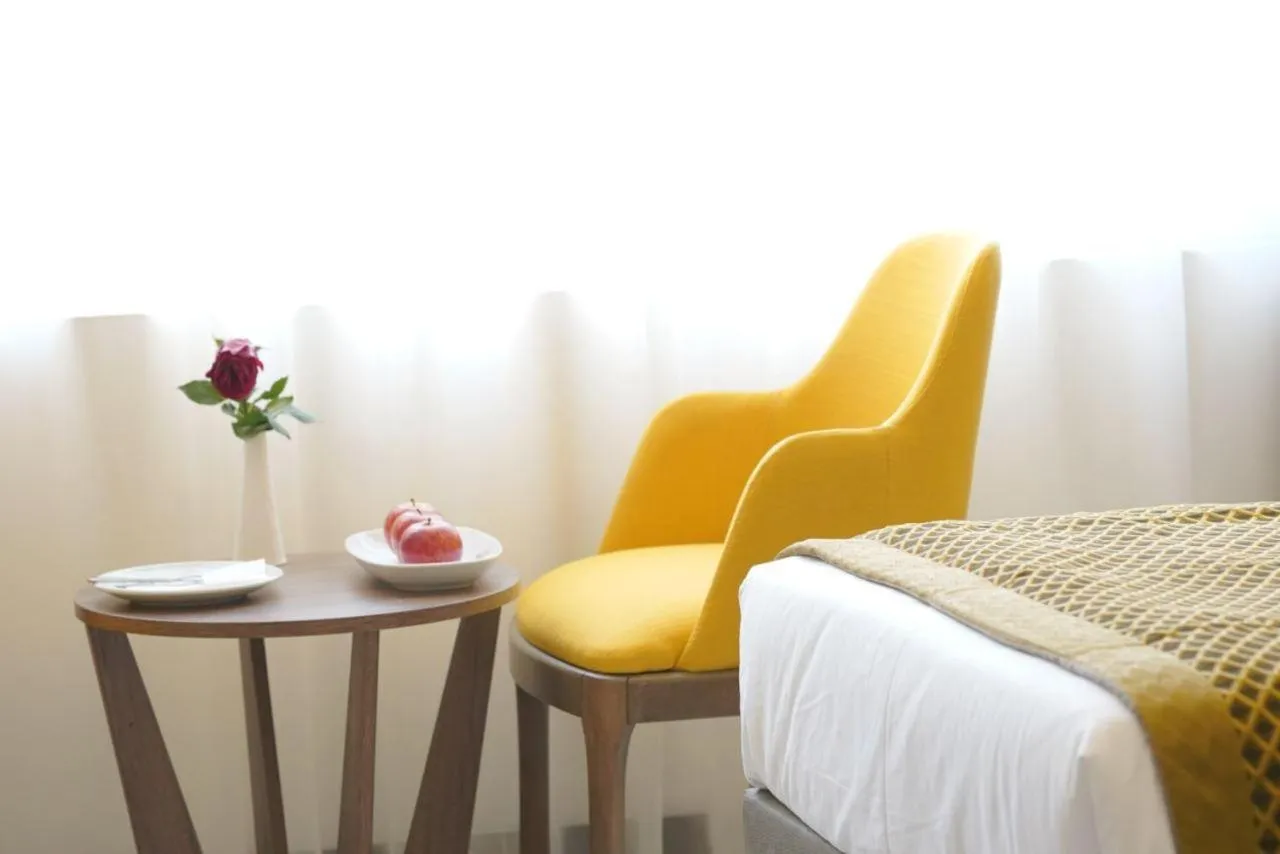 Living room, Bed in Noor Land Hotel