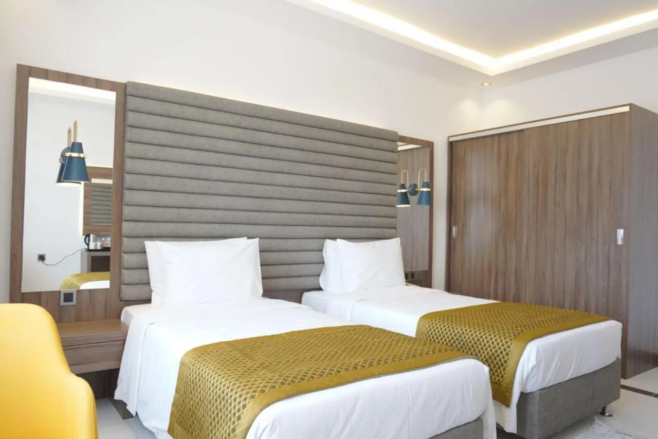 Bedroom, Bed in Noor Land Hotel