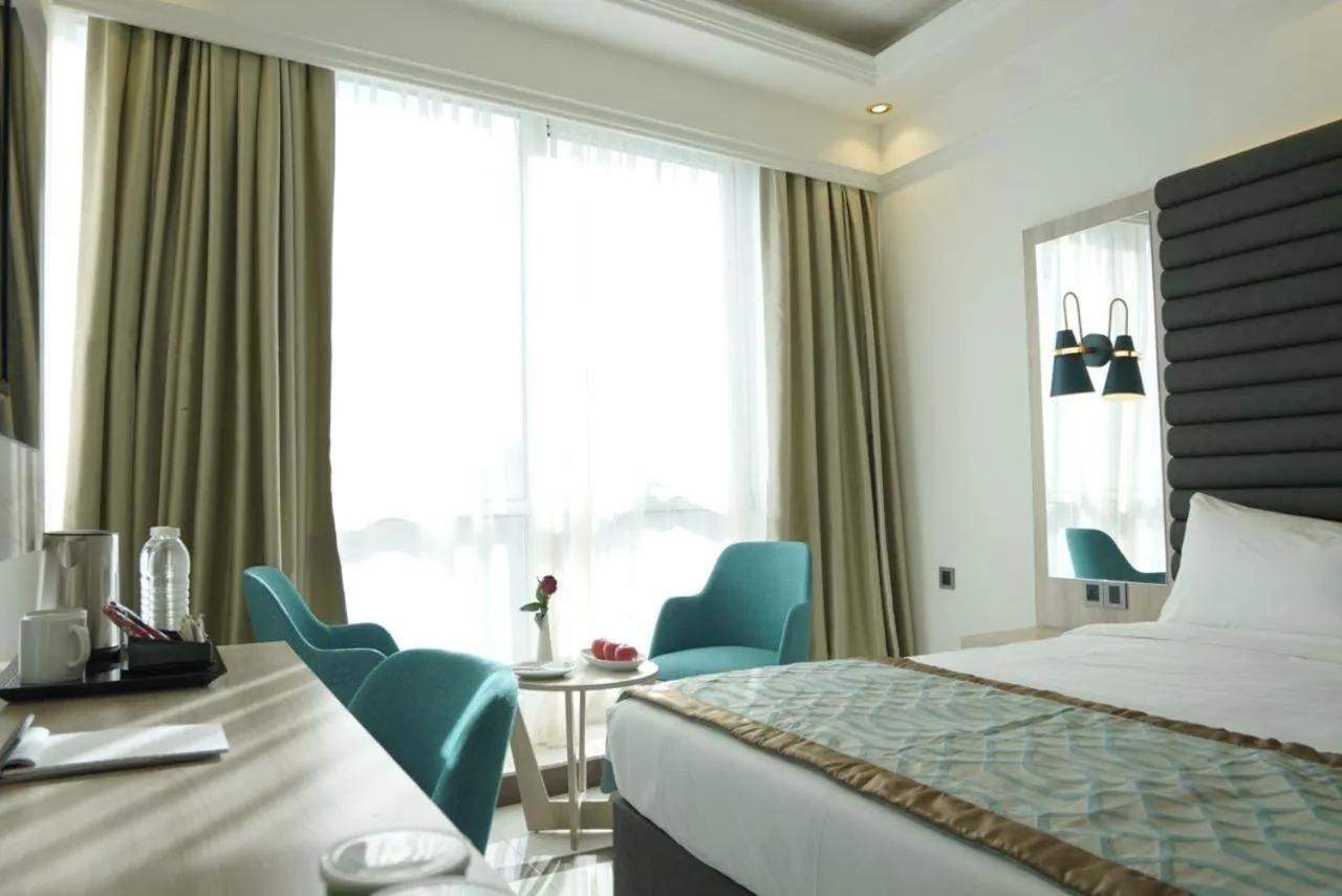 Photo of the whole room, Bed in Noor Land Hotel