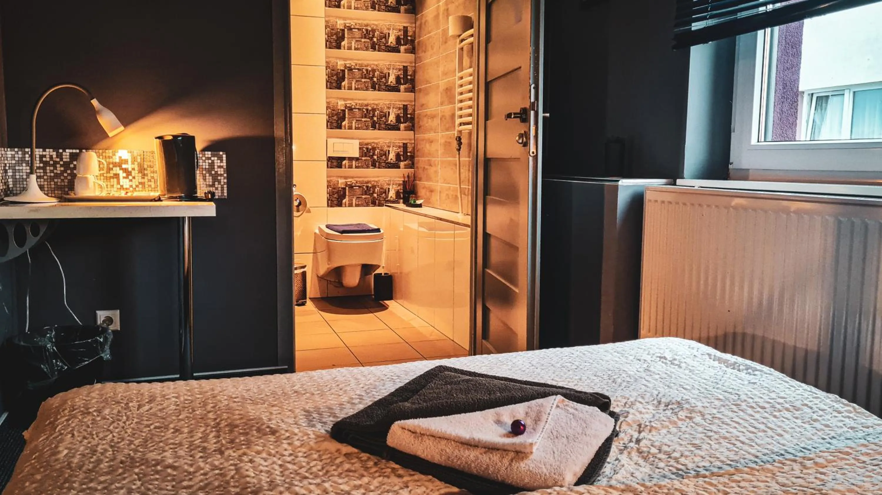 Toilet, Bed in Hotel 108