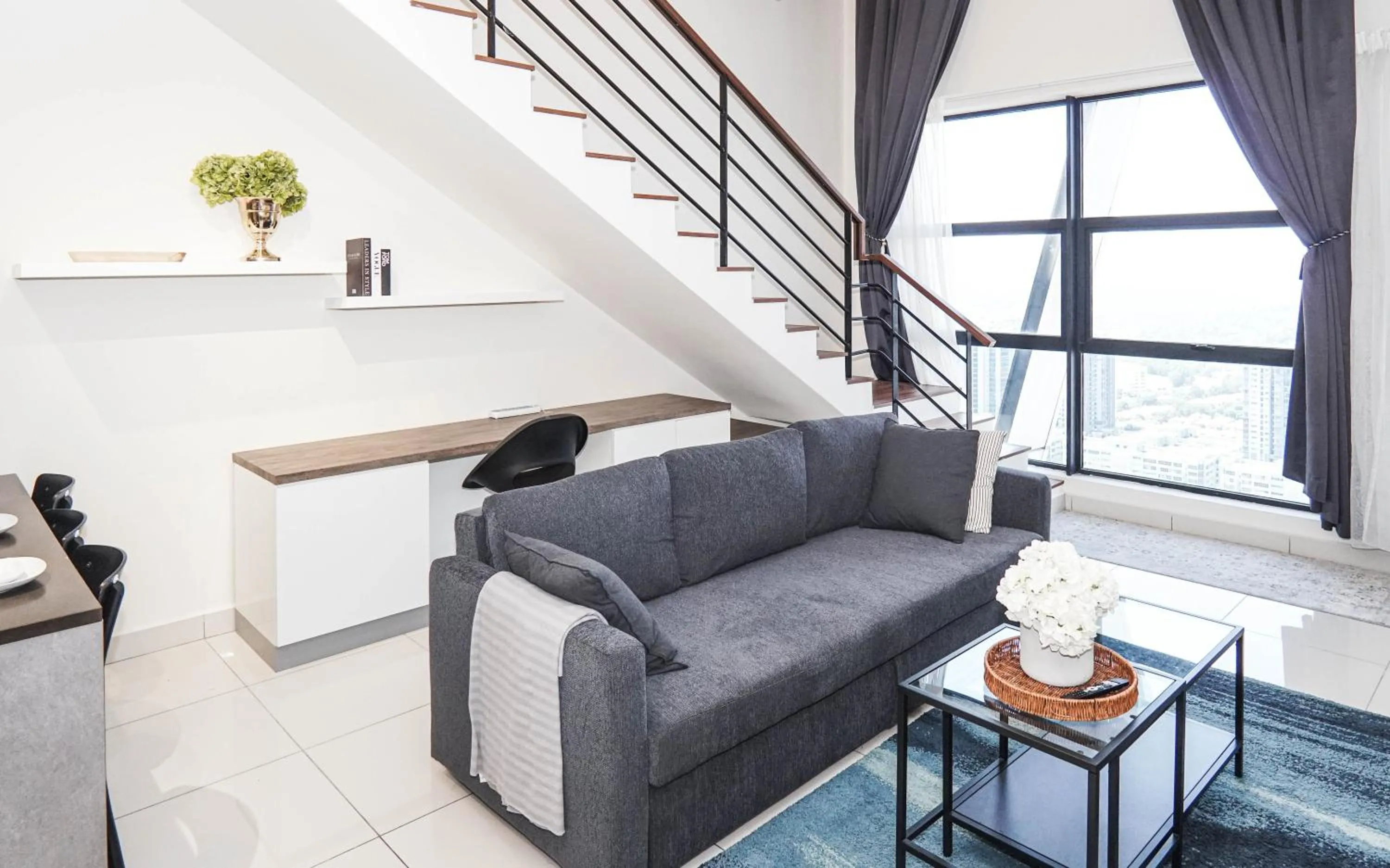 Living room in Arte Mont Kiara by Airhost