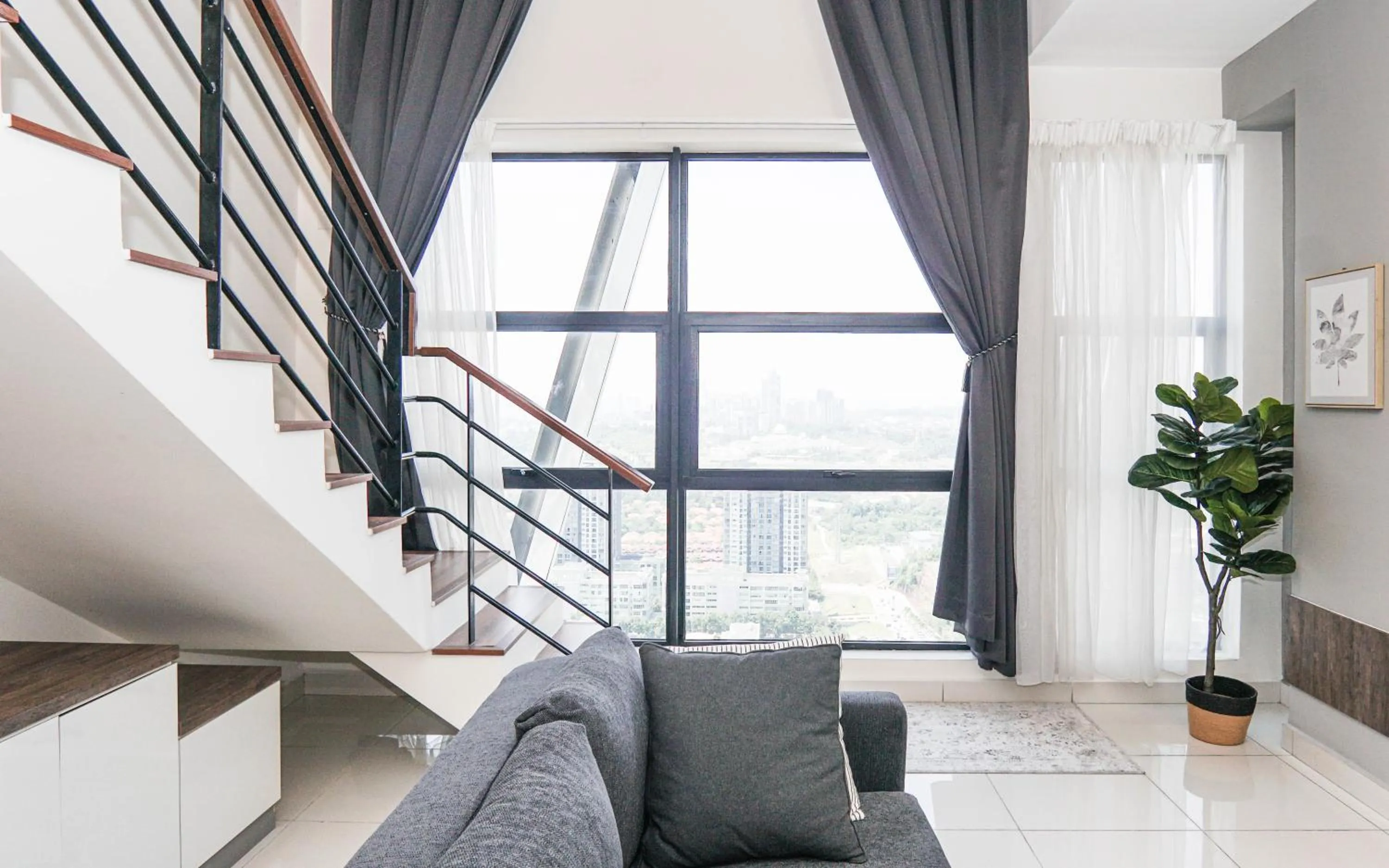 Living room in Arte Mont Kiara by Airhost