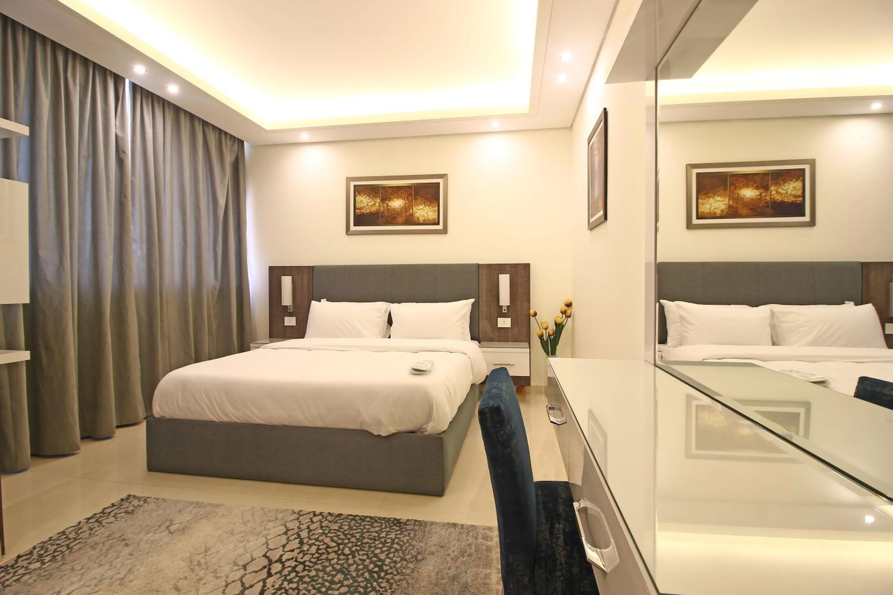 Bed in Palm Ville Suites