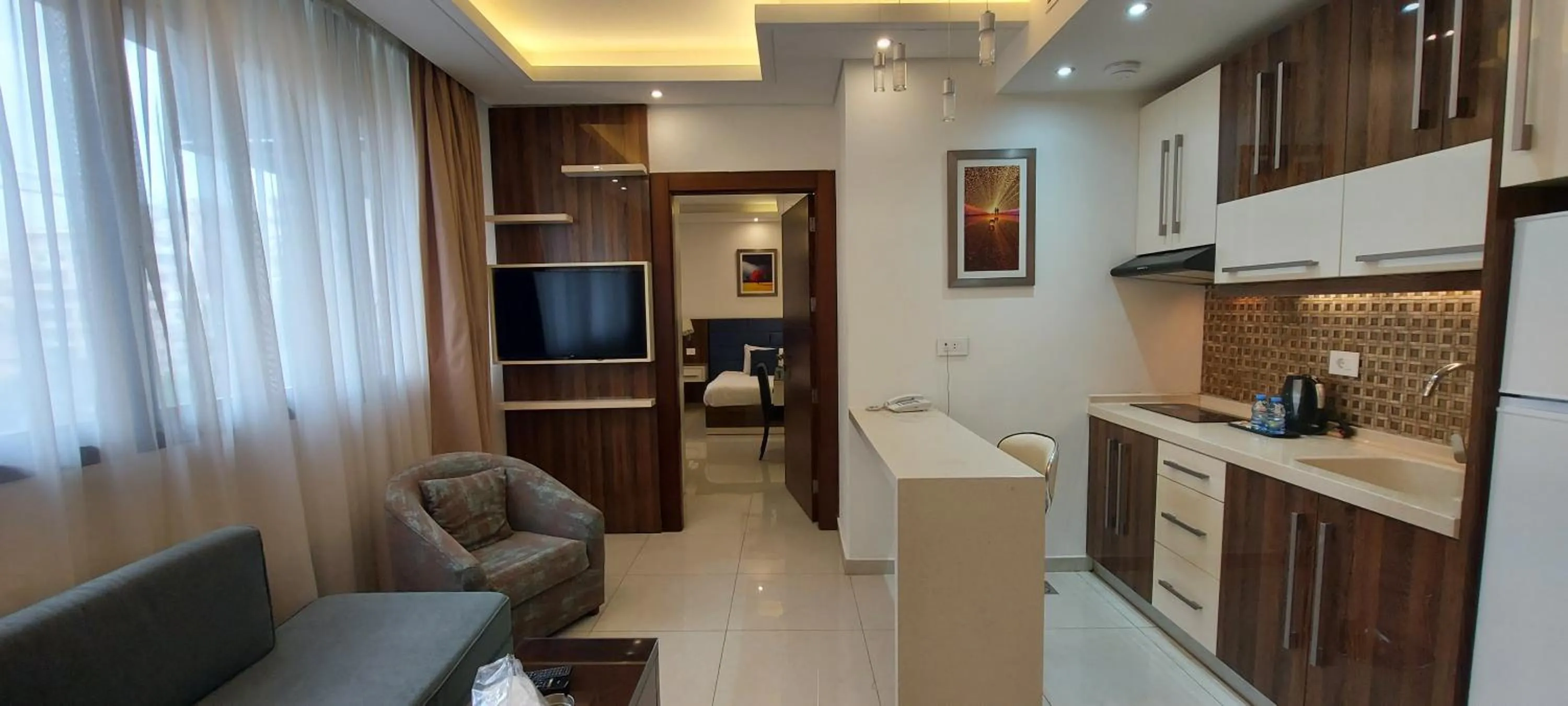 Kitchen or kitchenette in Palm Ville Suites