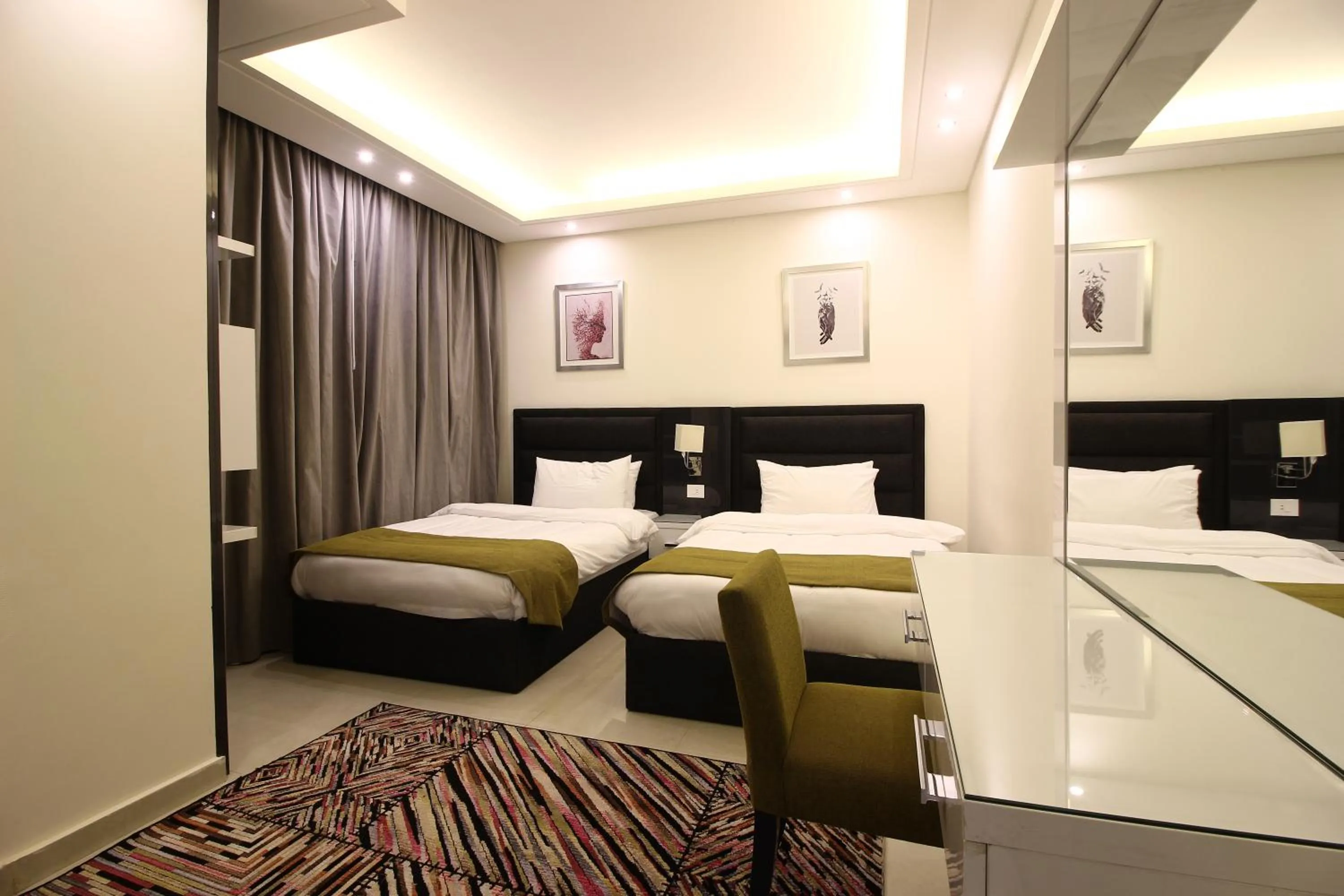 Bed in Palm Ville Suites