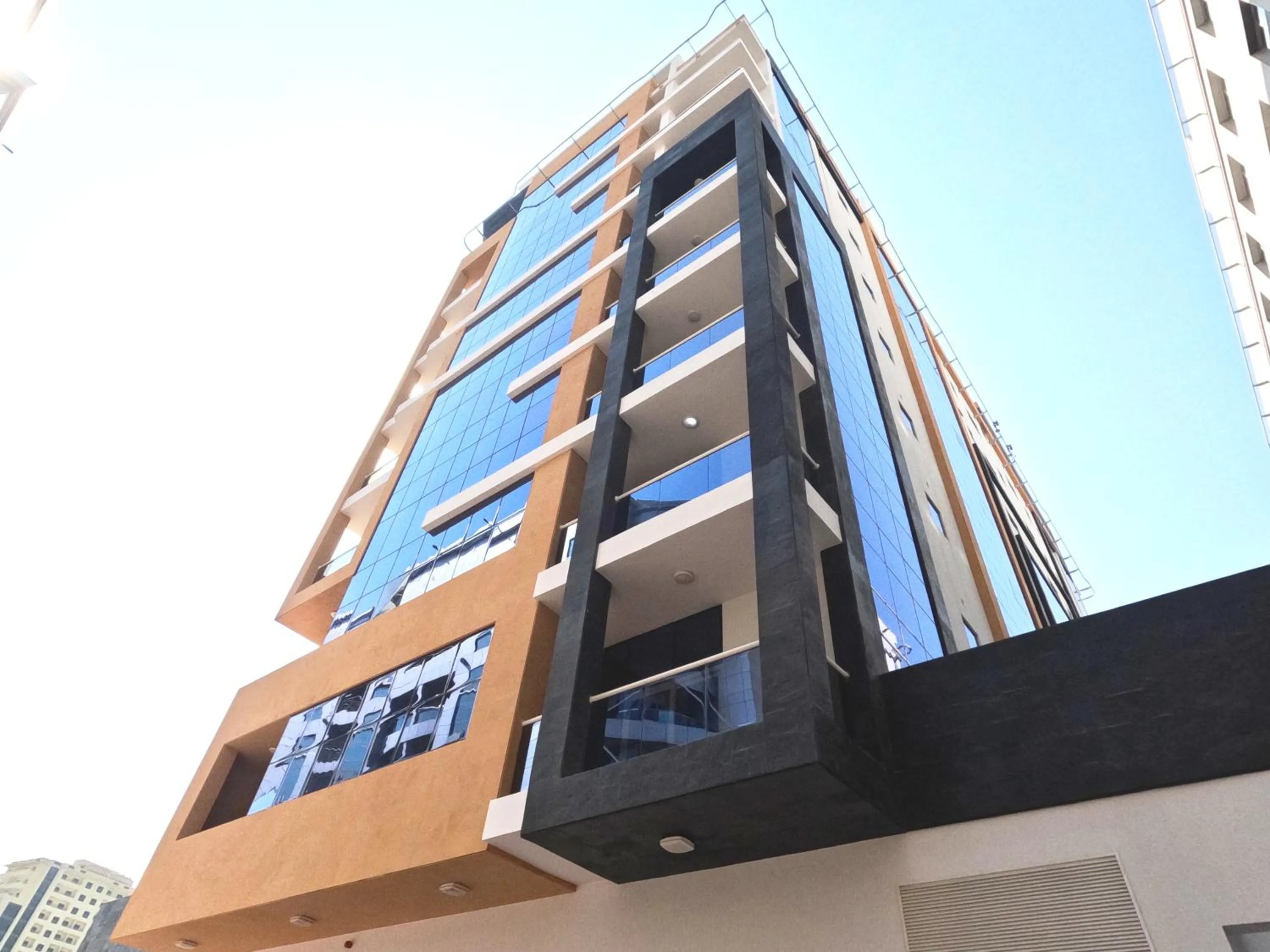 Property building in Barsha Star Residence - Home Stay