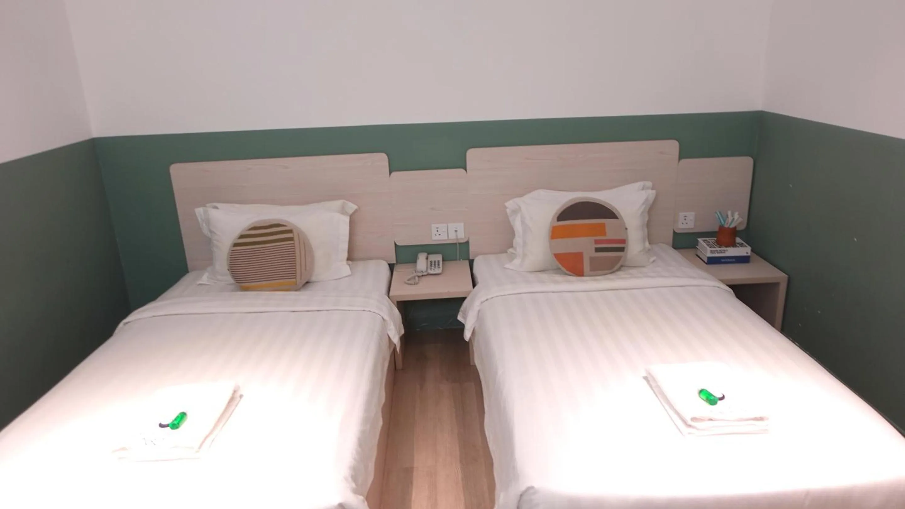 Bed in All Are Welcome Lawas Boutique Hotel