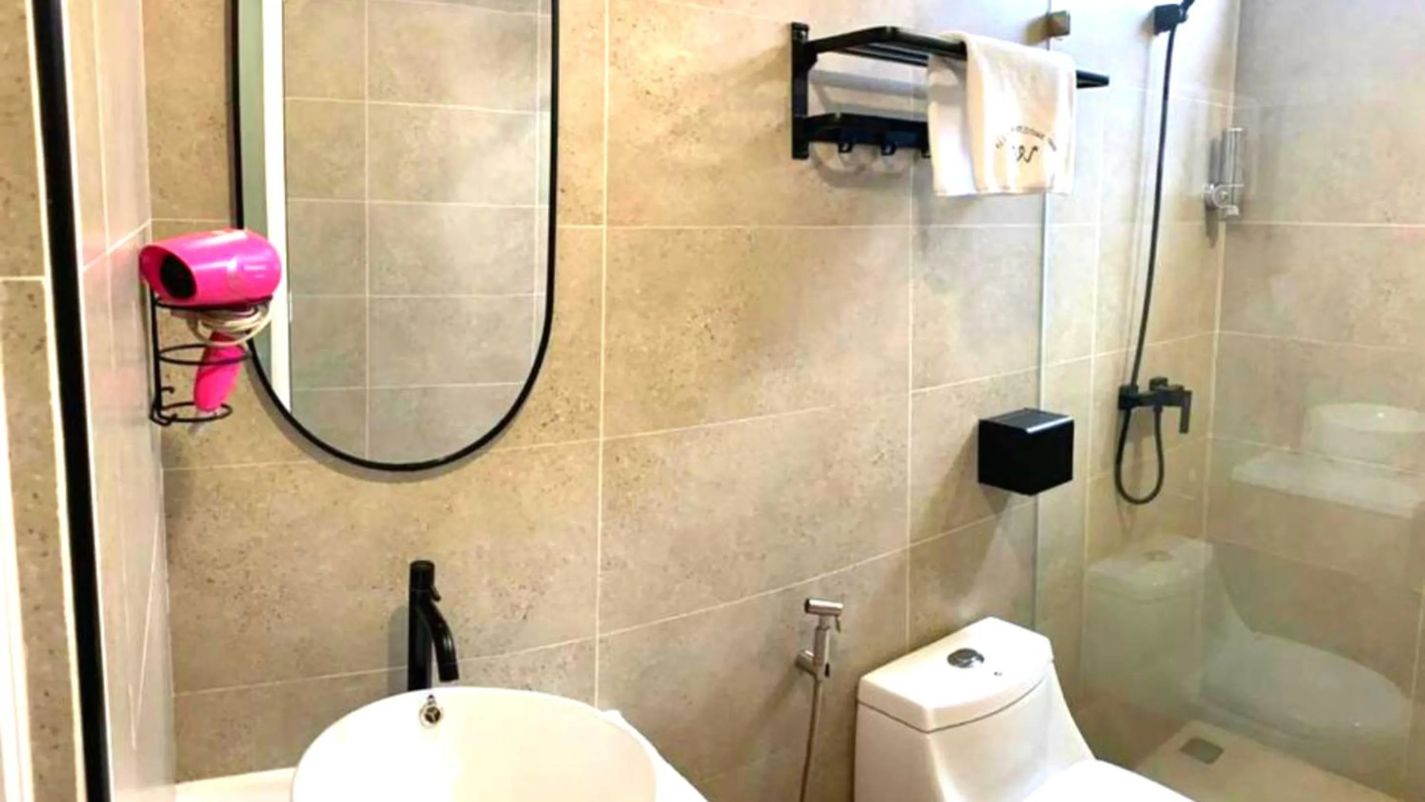 Shower in All Are Welcome Lawas Boutique Hotel