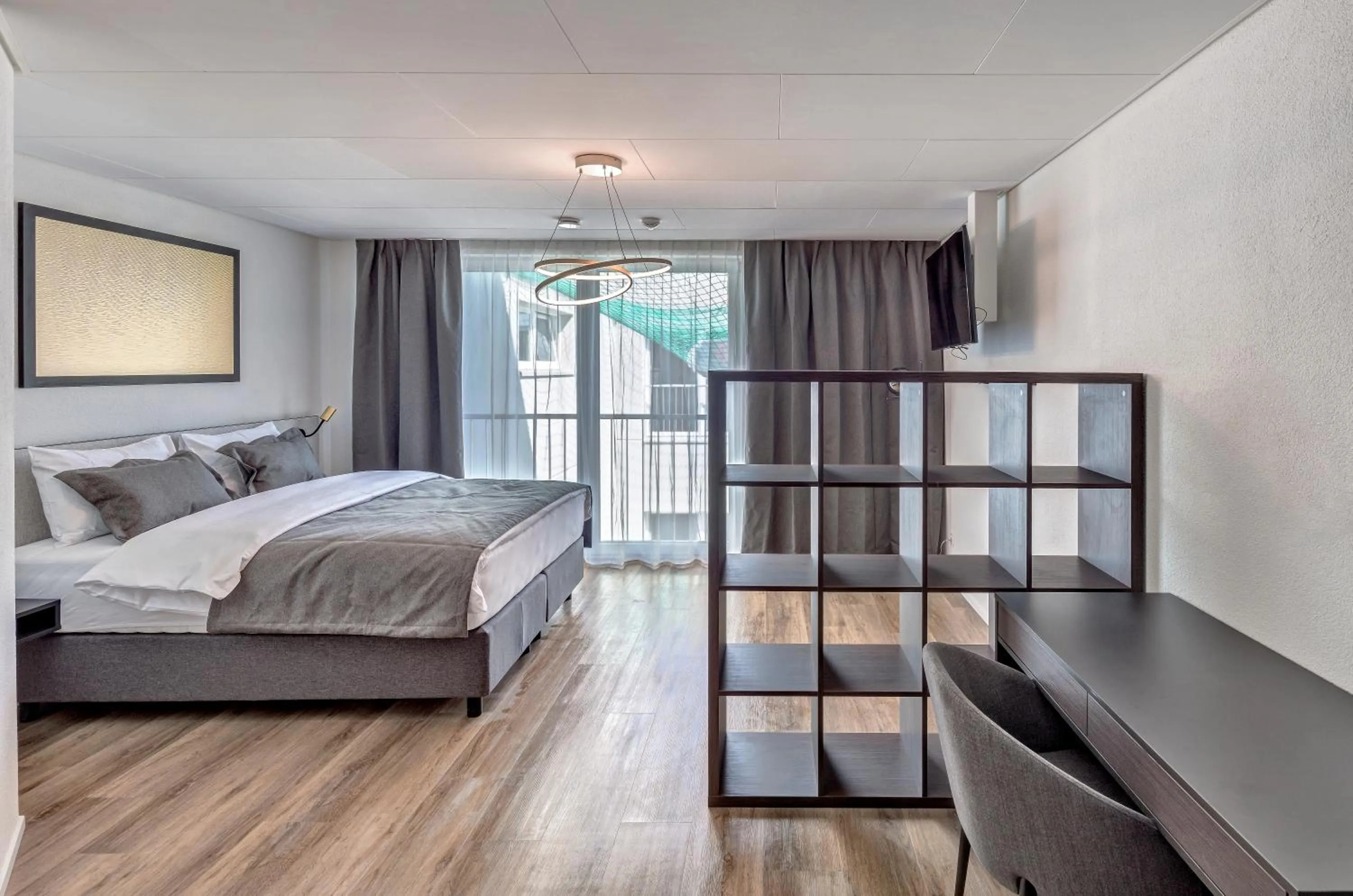 Photo of the whole room, Bed in MOOI Apartments Schlieren