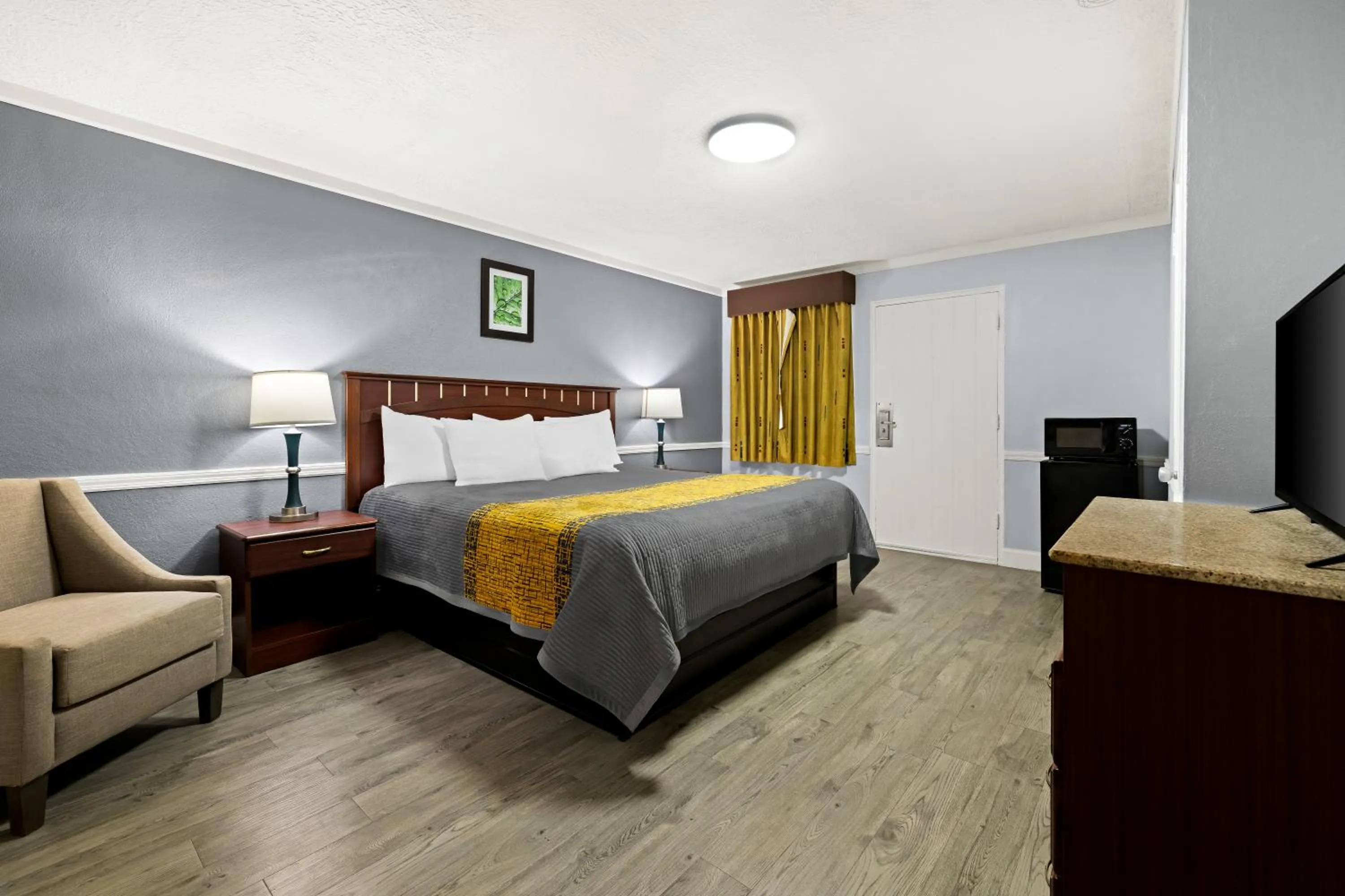 Bedroom, Bed in Village Haven Inn & Extended Stay