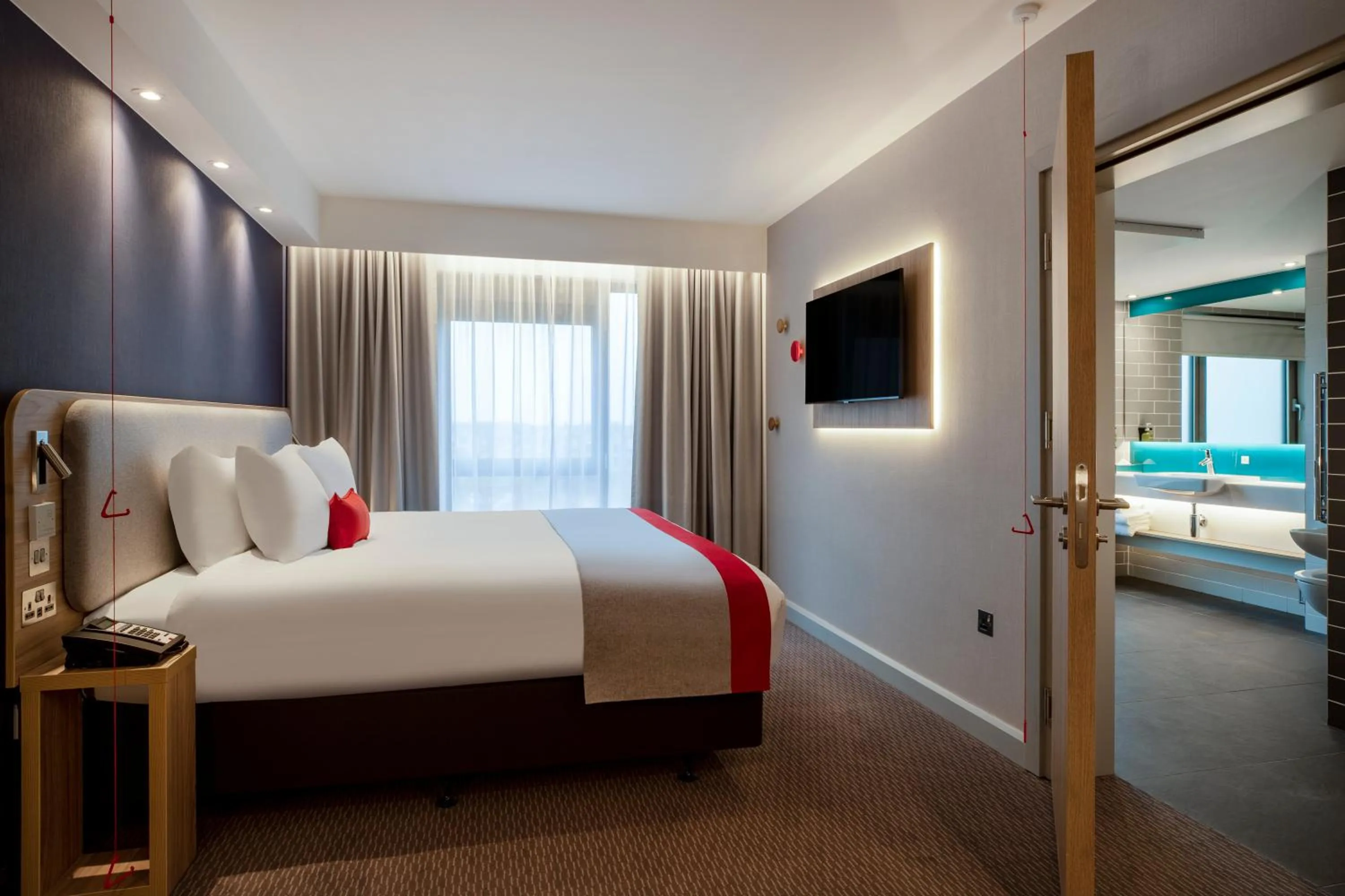 Bedroom, Bed in Holiday Inn Express Cambridge West - Cambourne by IHG