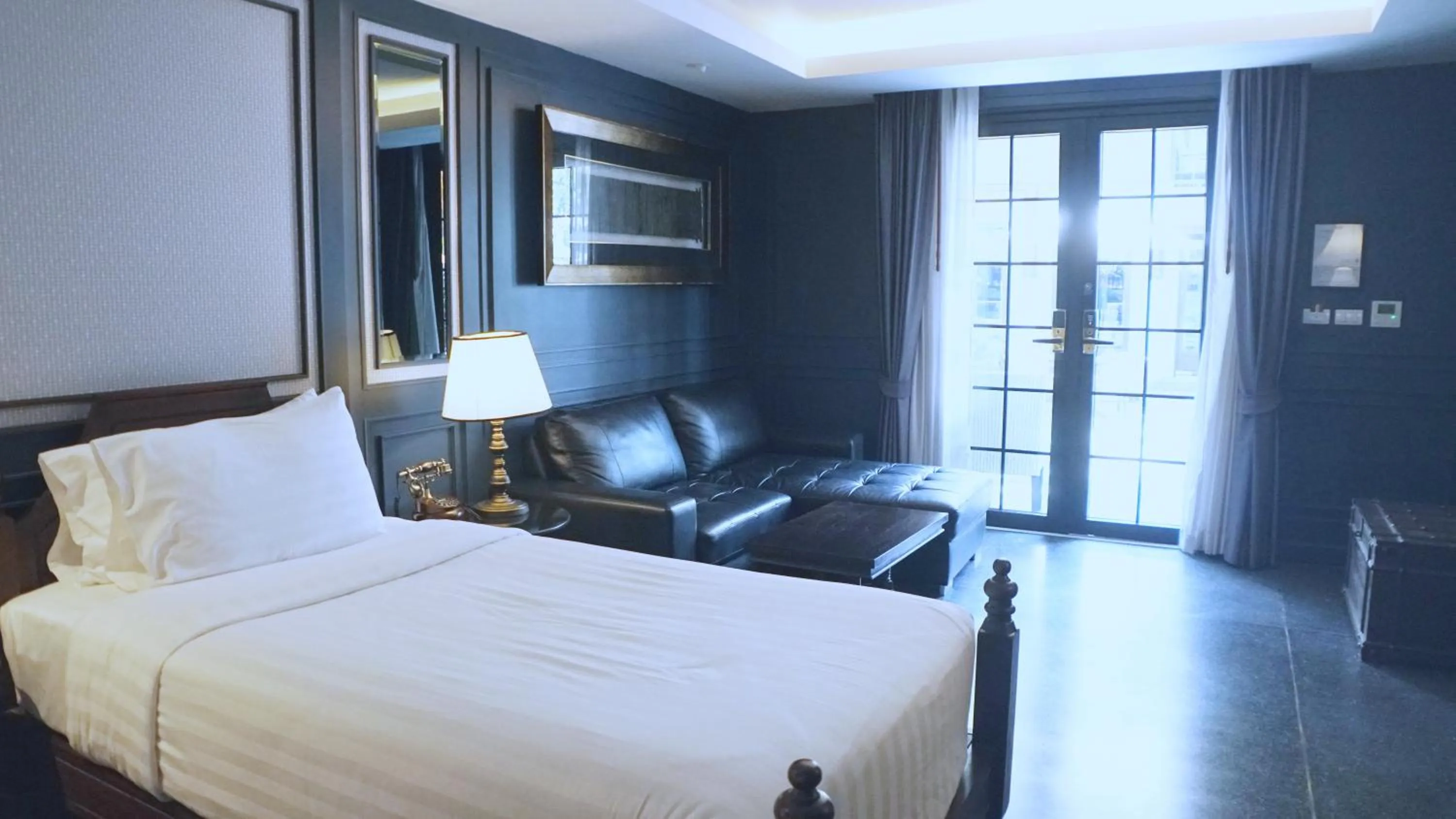 Bed in Buri Sriping Riverside Resort & Spa