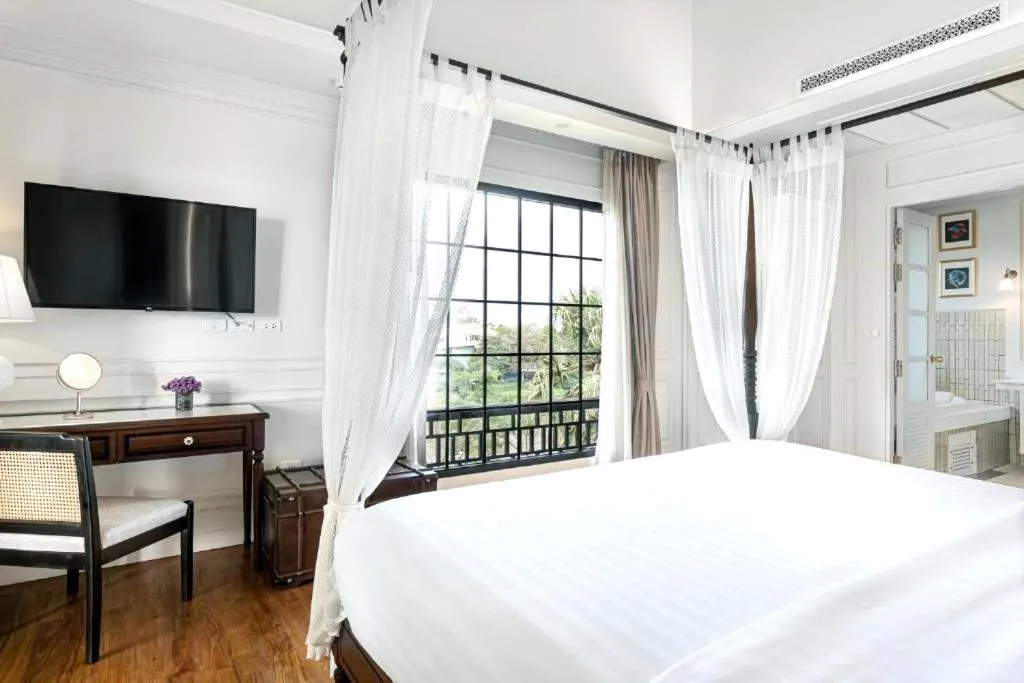 Bed in Buri Sriping Riverside Resort & Spa