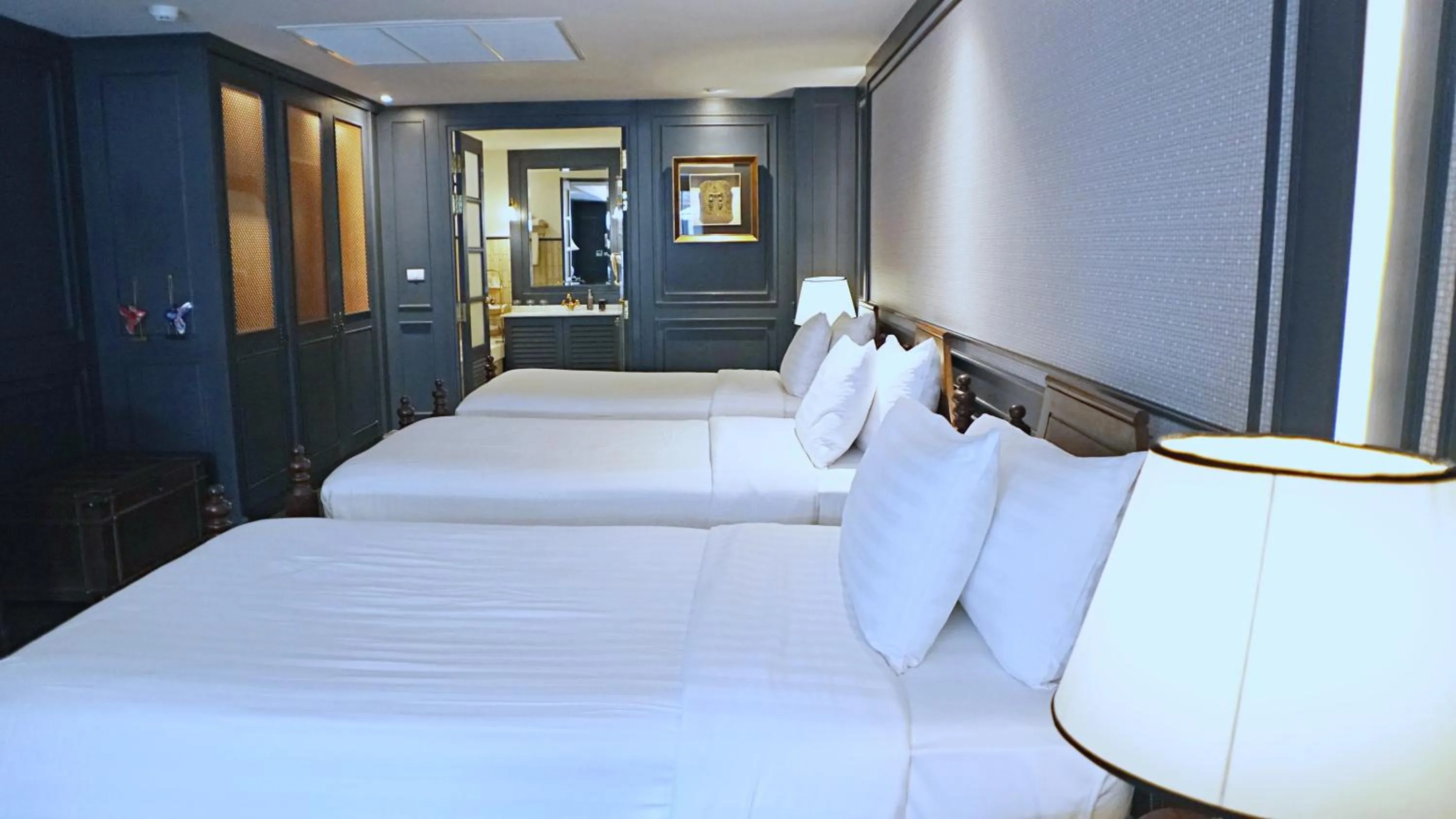 Bed in Buri Sriping Riverside Resort & Spa